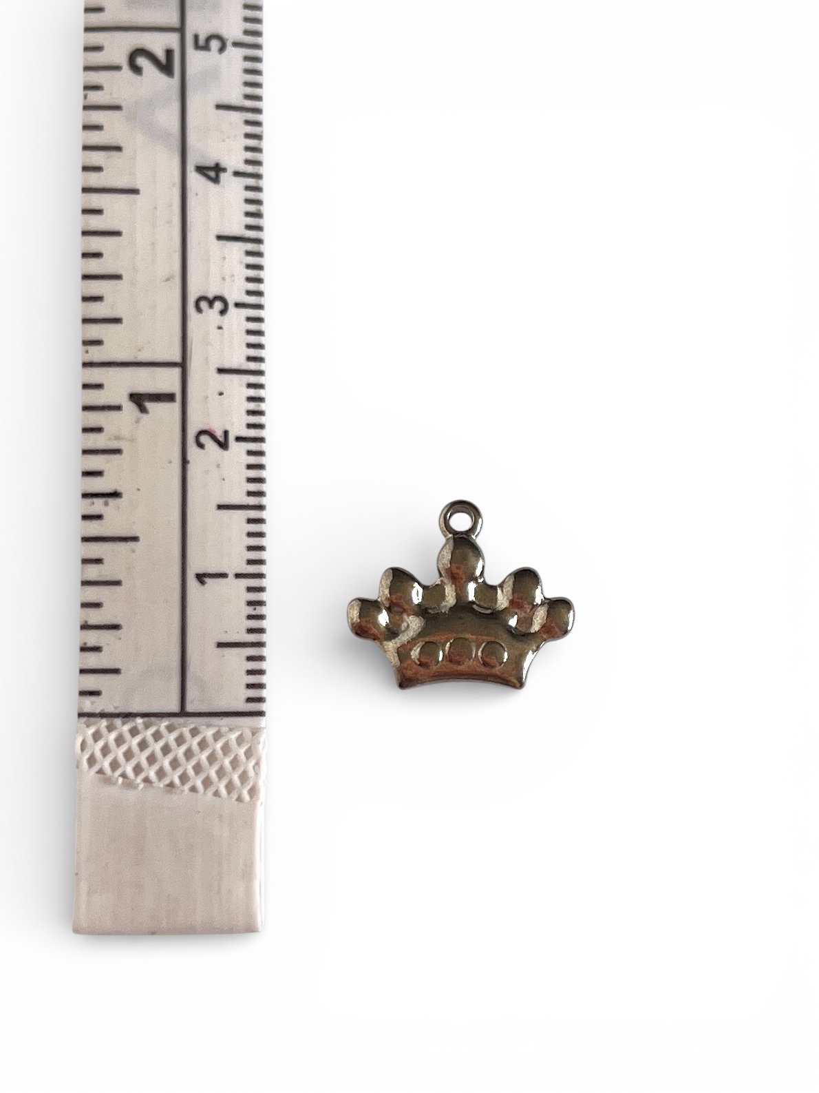 Silver crown charm with rounded point