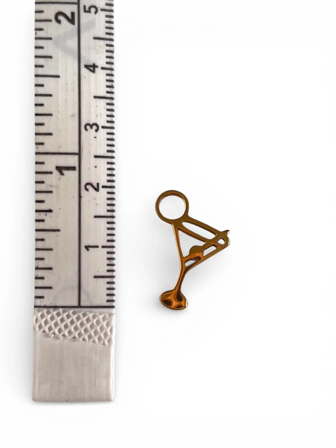 gold martini glass charm with olives