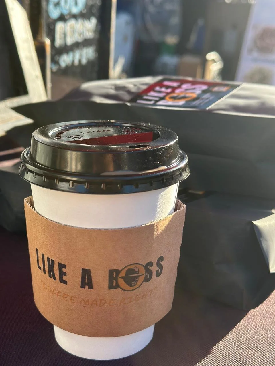Hot coffee and coffee beans in a bad