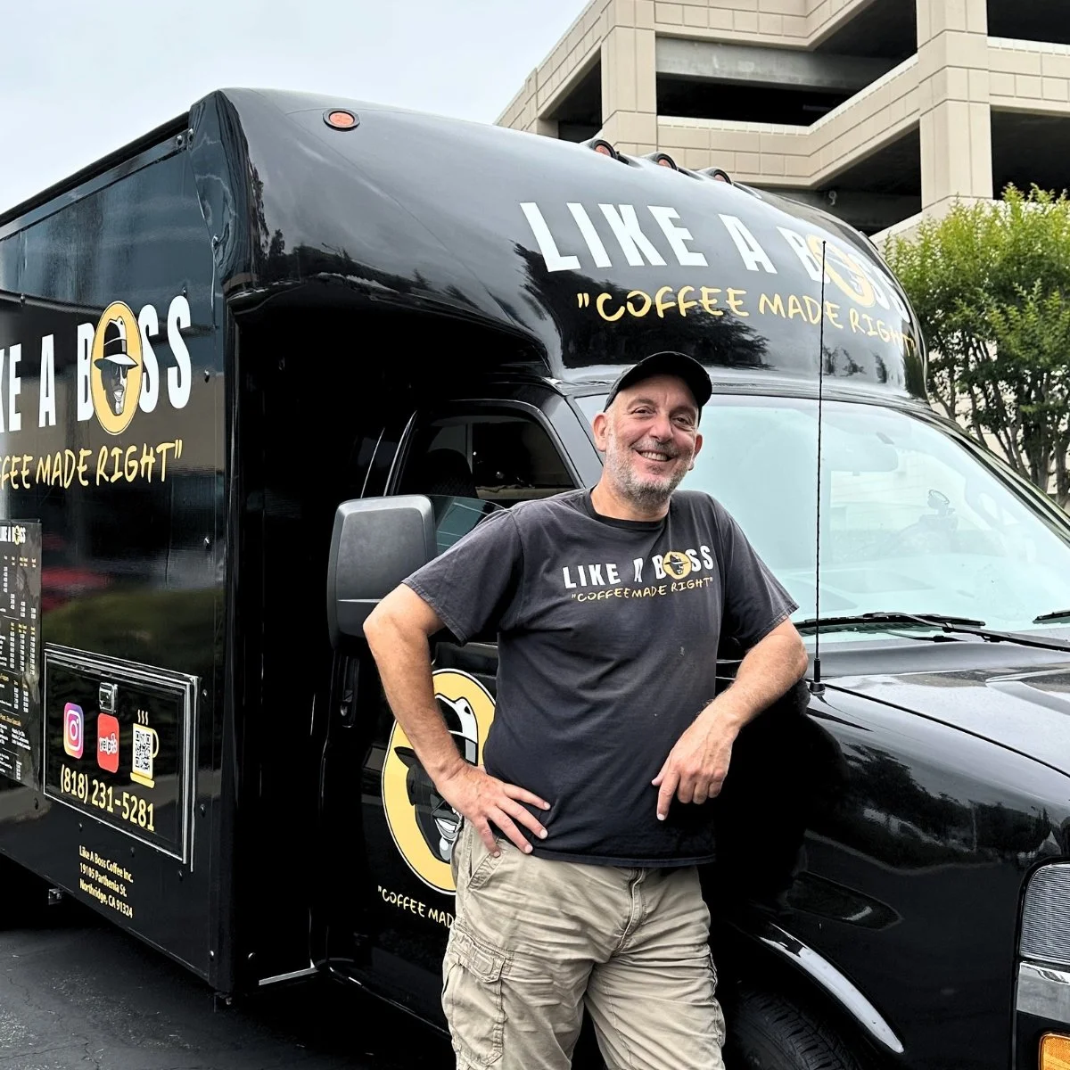 Owner, Sherif, in front of coffee truck at corporate event location