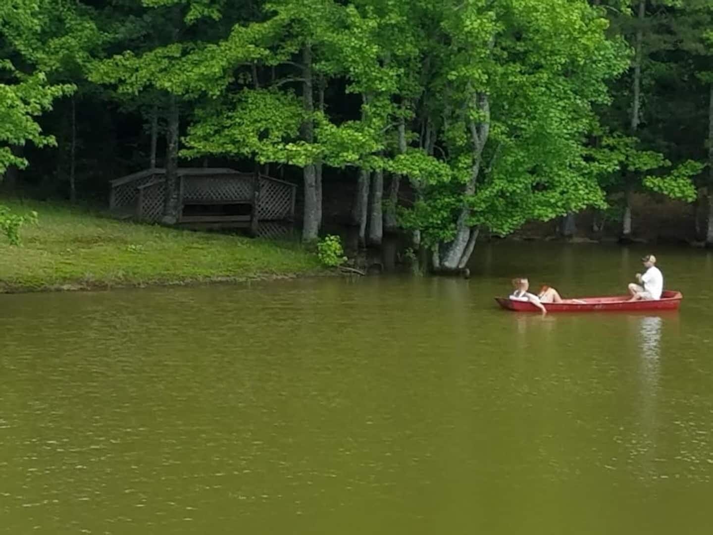 Our guests are invited to paddle along the tree lined pond in our flat-bottom boat or in one of our two kayaks..jpeg
