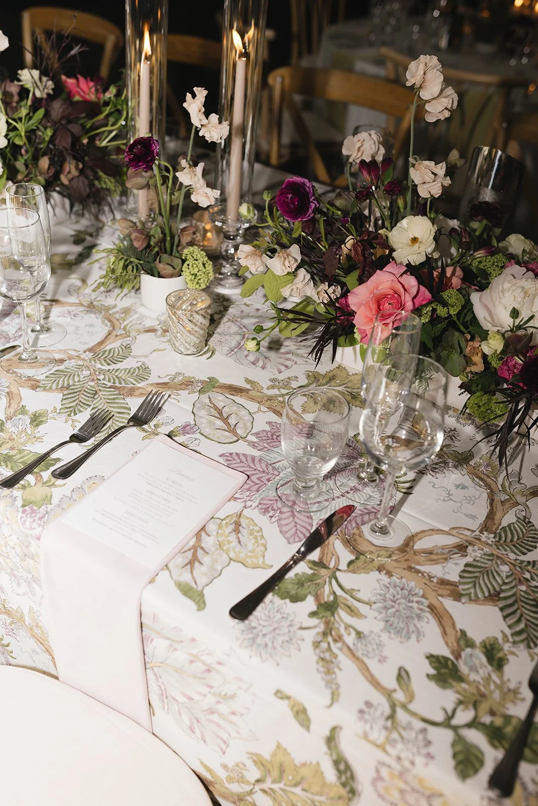 Luxury California wedding reception featuring a candlelit table with lush florals, layered linens, and elegant olive velvet chairs. A timeless, editorial-inspired design creating a romantic and unforgettable guest experience.

Luxury California weddi