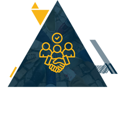 Woman with braided hair holding a microphone, standing near a whiteboard with writing.