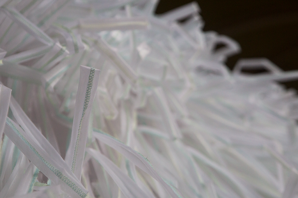 Discarded face masks used as material in Alma, Marjorie Chau’s environmental art installation on ecological loss.