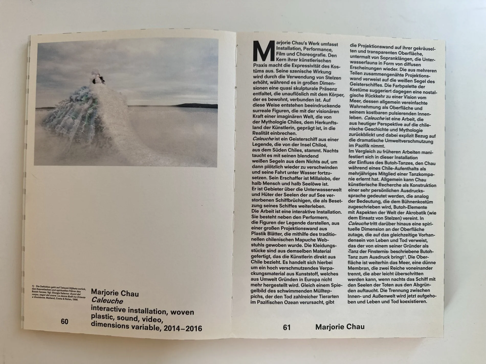 Publication spread featuring a sculptural costume by Marjorie Chau in a snow-covered mountain landscape.