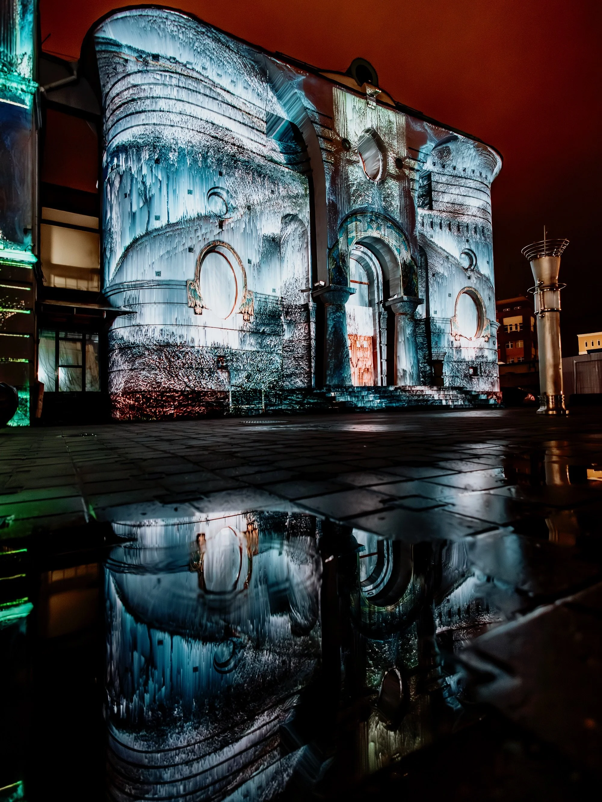 We love the reflections in the water - it feels like an extension of the mapping itself.

Sensum originated from real-time environmental data from Nizhny Novgorod - temperature, humidity, air quality and atmospheric conditions - later transformed int