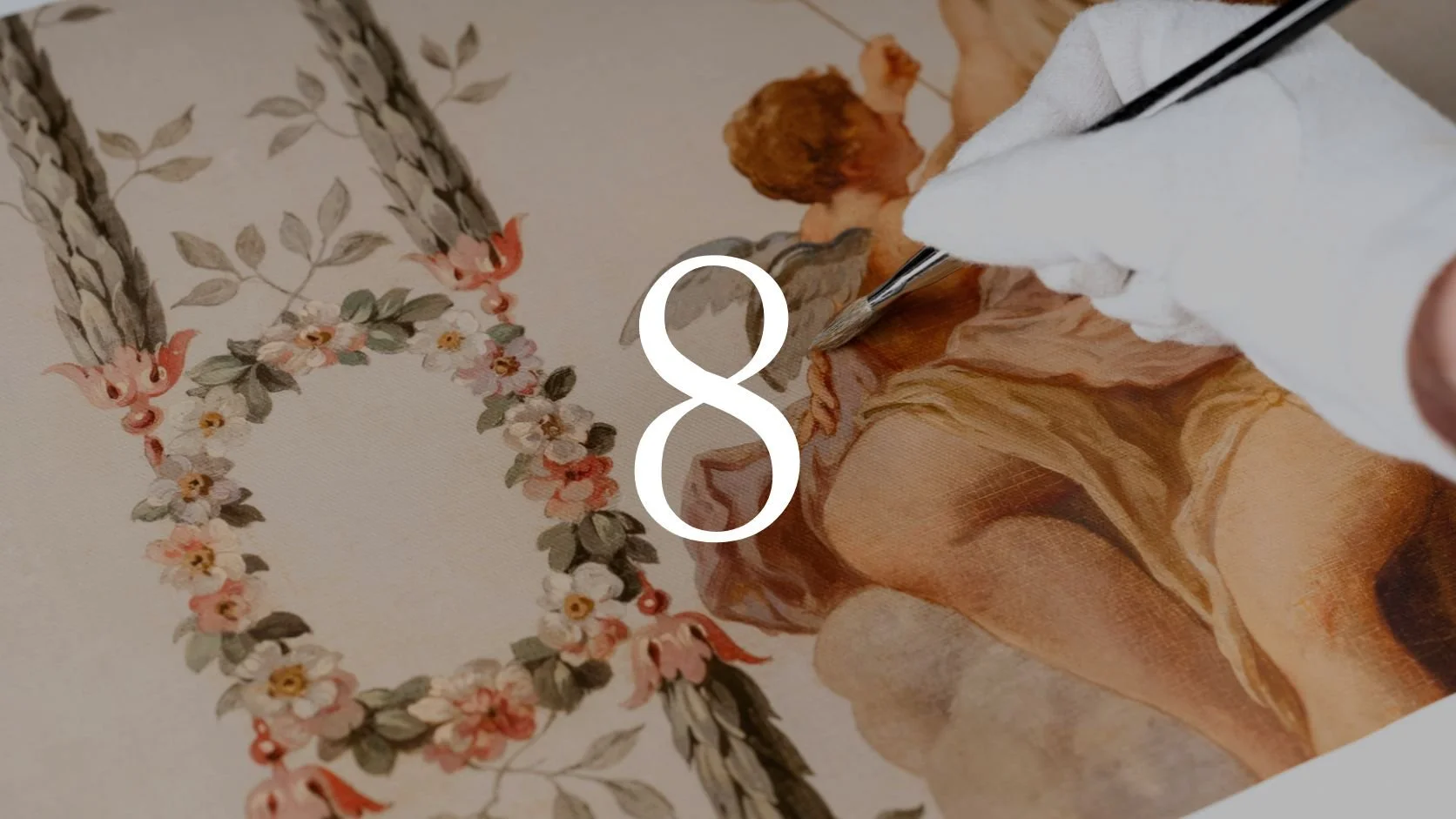 A person wearing white gloves painting a classical-style portrait of a woman with a floral arch in the background.