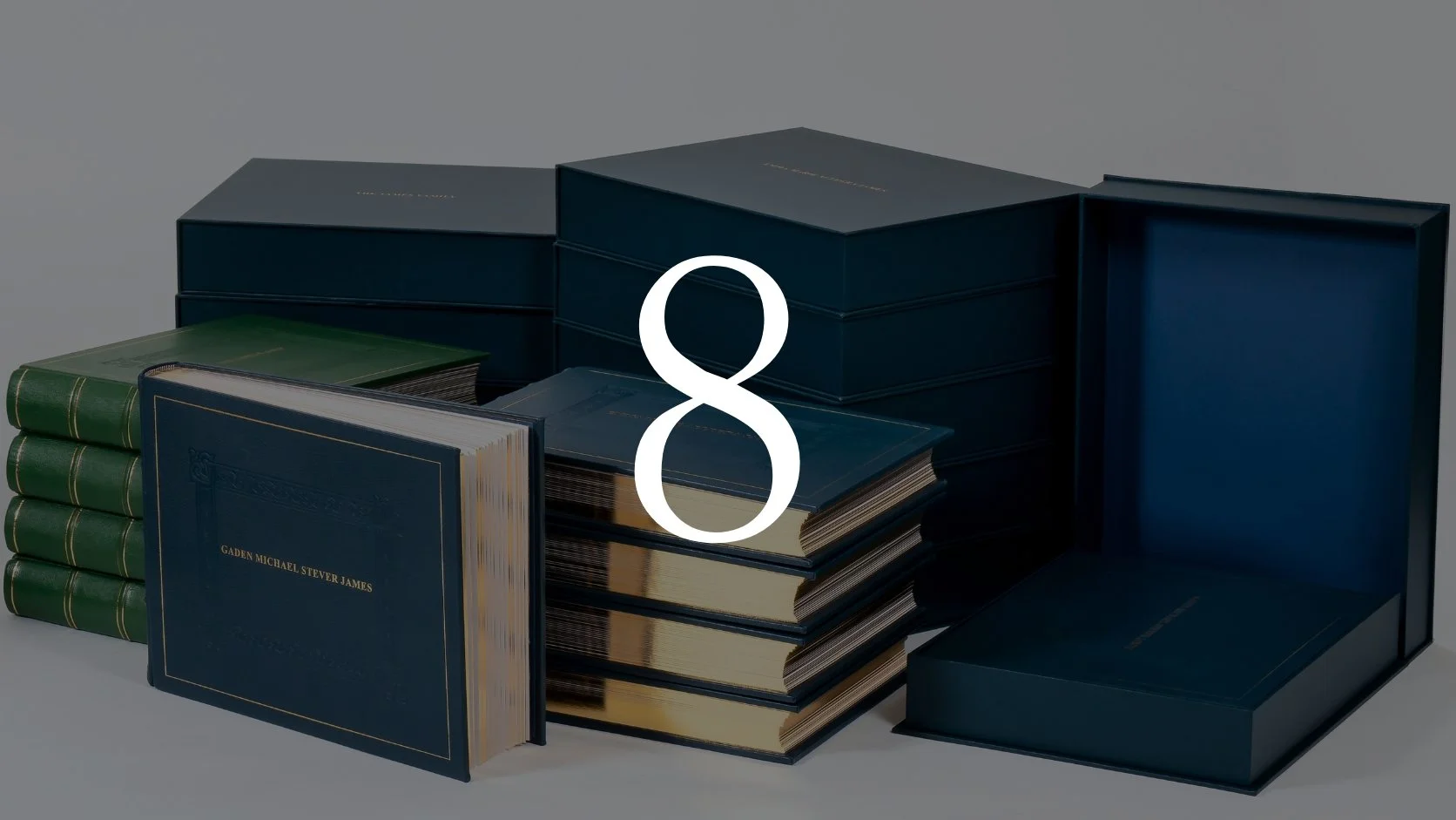Stack of blue and green books, some in boxes, with a large white number 8 overlayed.