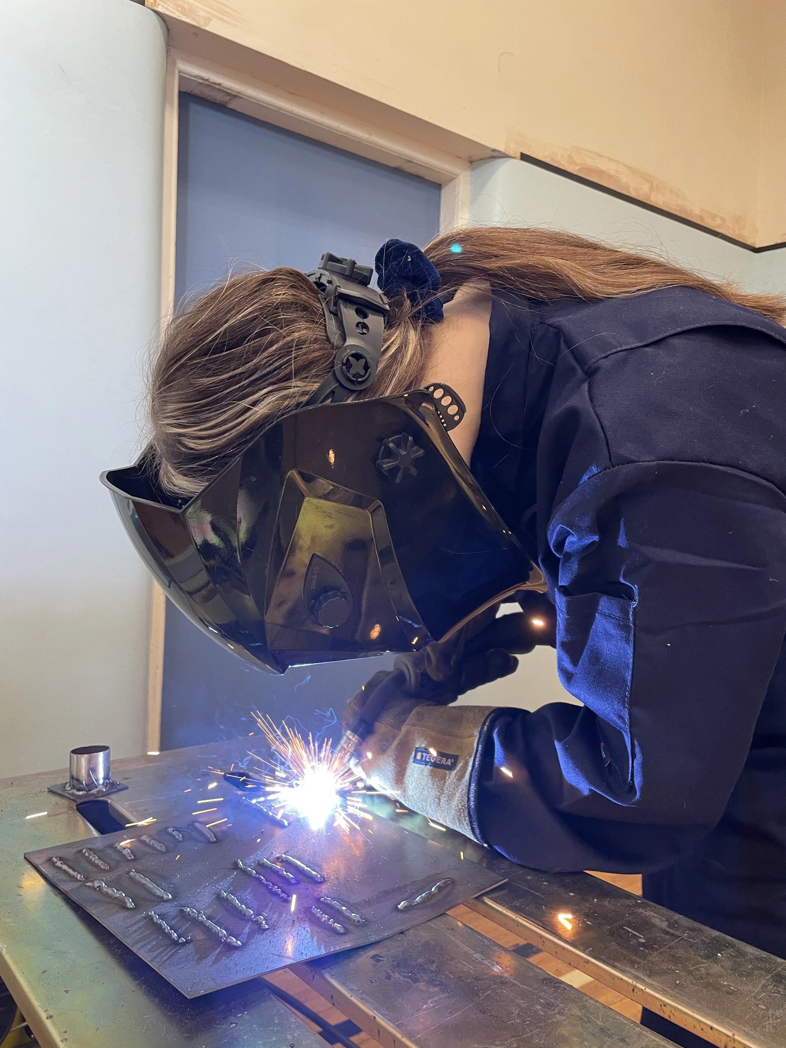 welding girl.jpeg