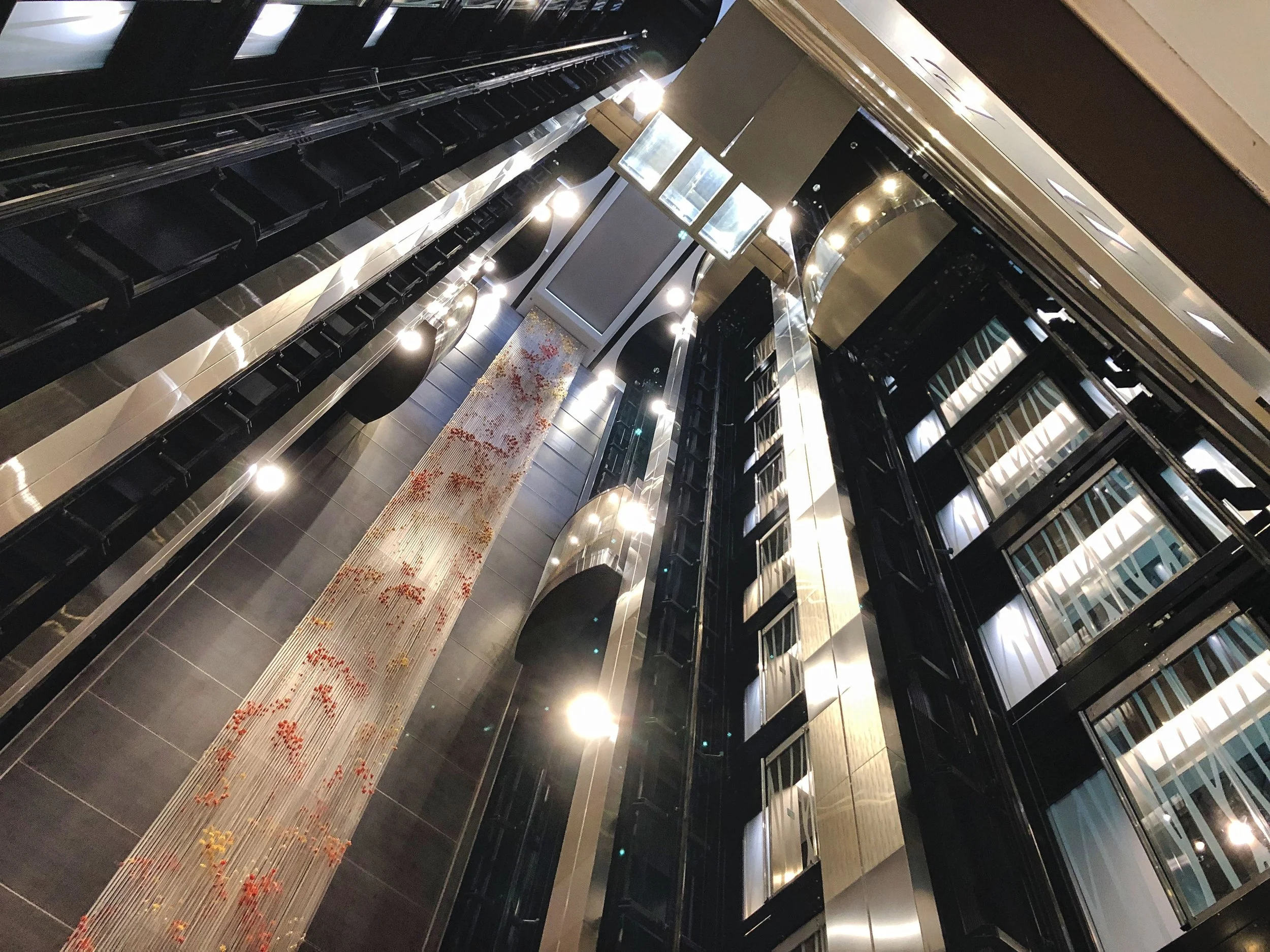 A view of the elevators. Look for the three panes of glass, that's the see through floor. You can walk on the glass.