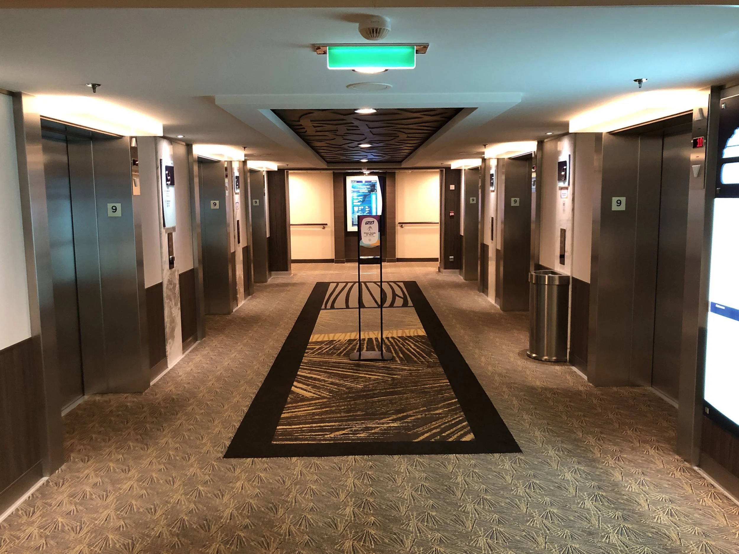 Waiting for our elevator to go for dinner.