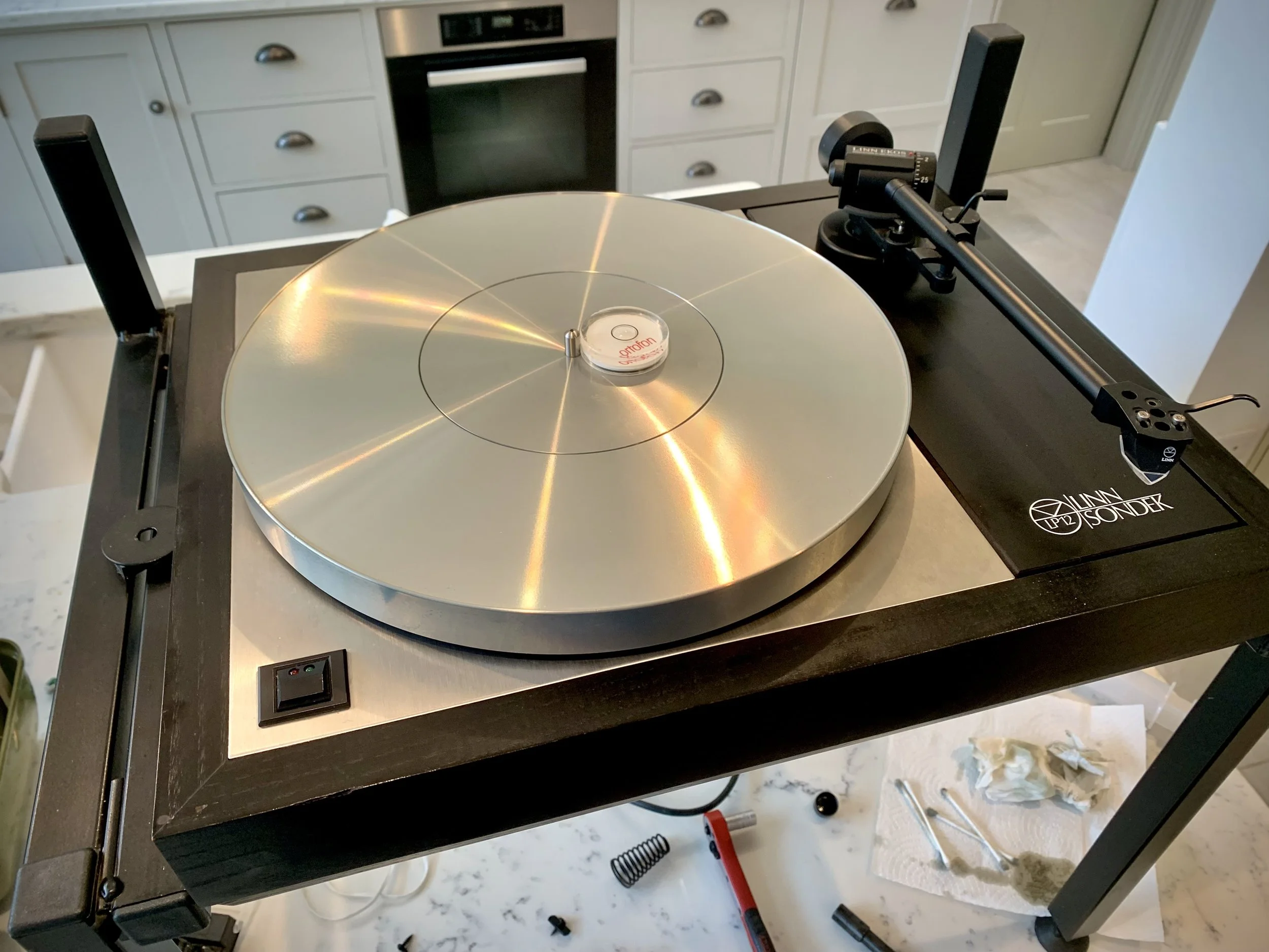 Full service and tonearm/cartridge adjustment. 