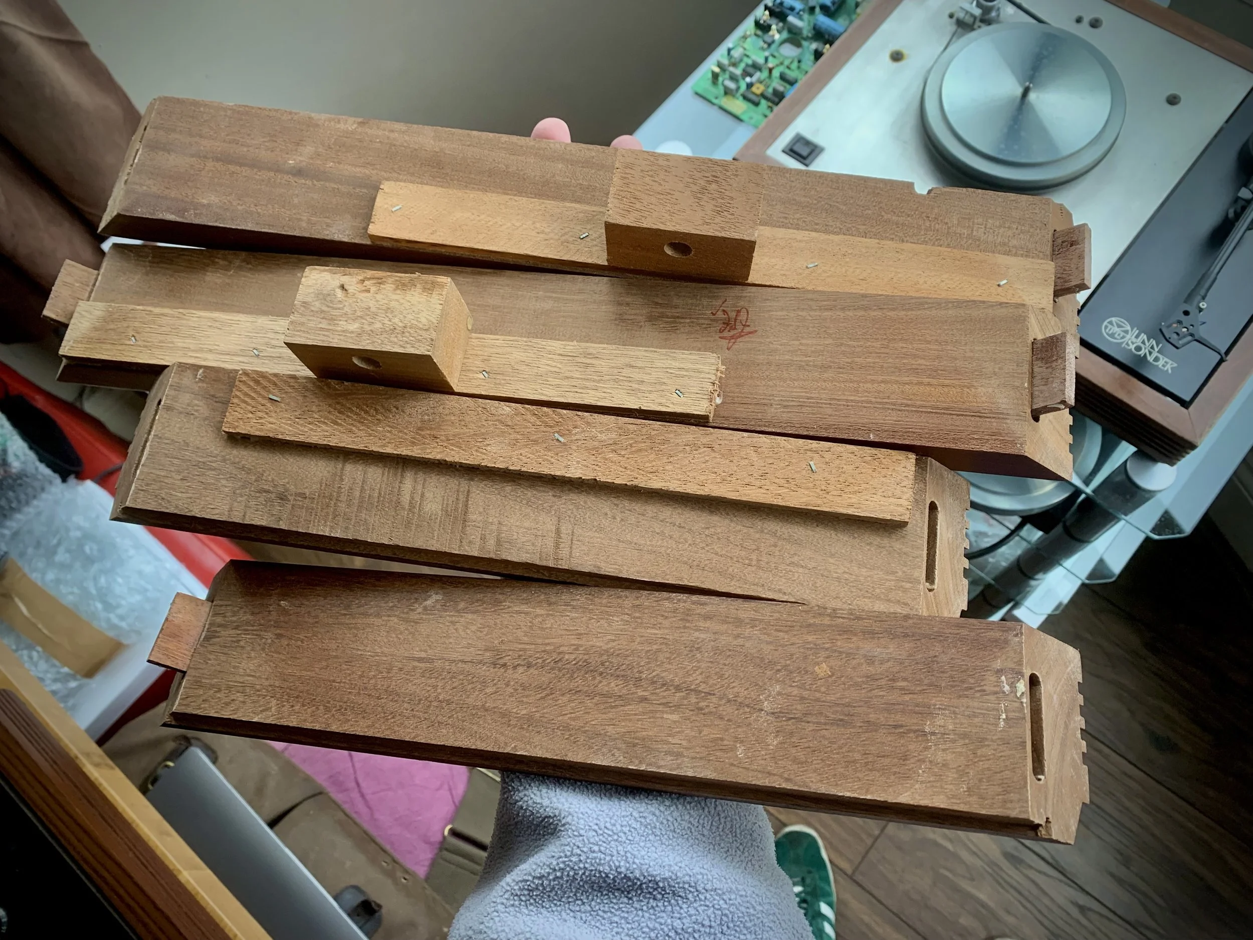 Complete failure of plinth mitres requiring resurfacing and regluing.