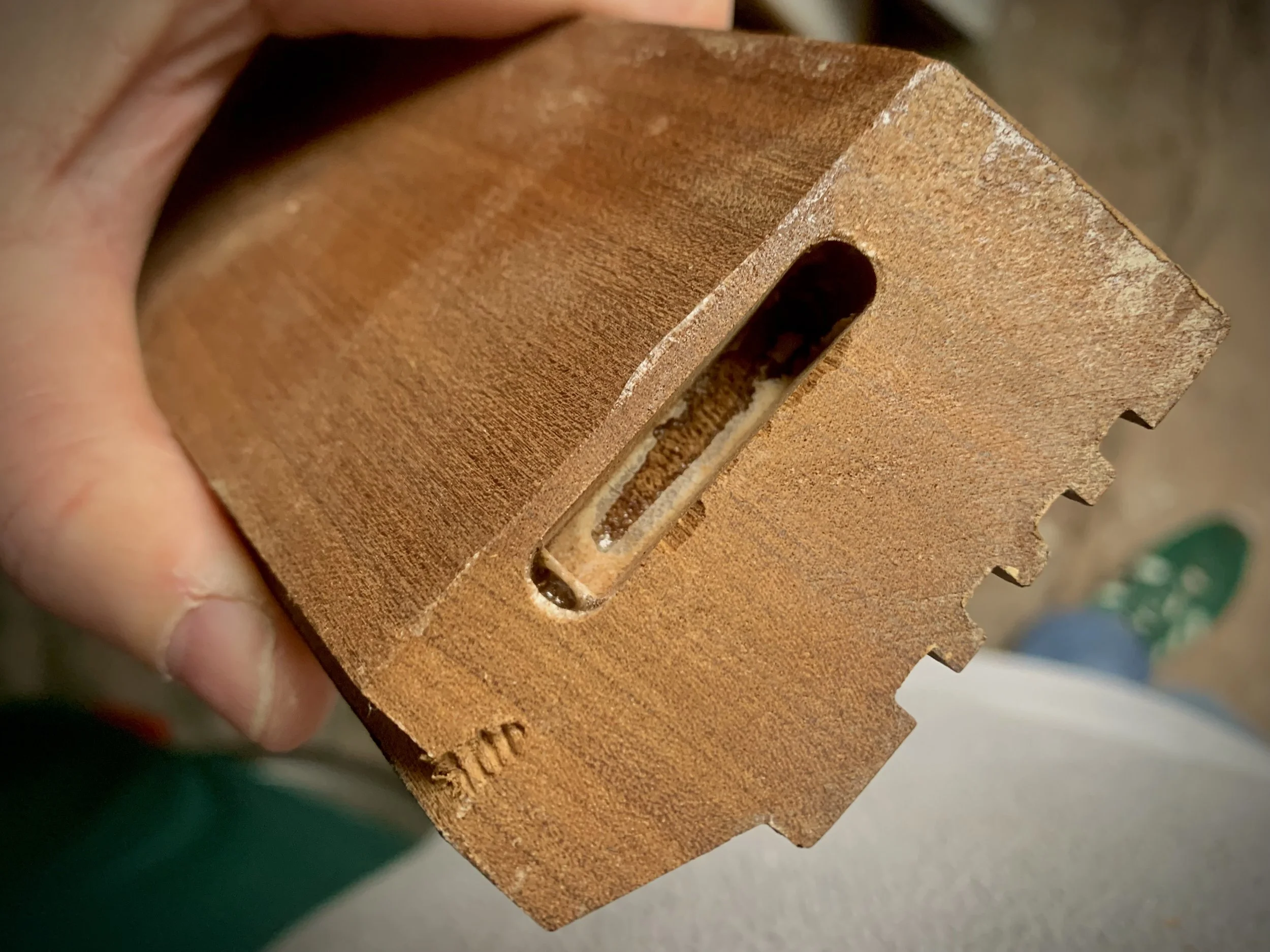 Complete failure of plinth mitres requiring resurfacing and regluing.