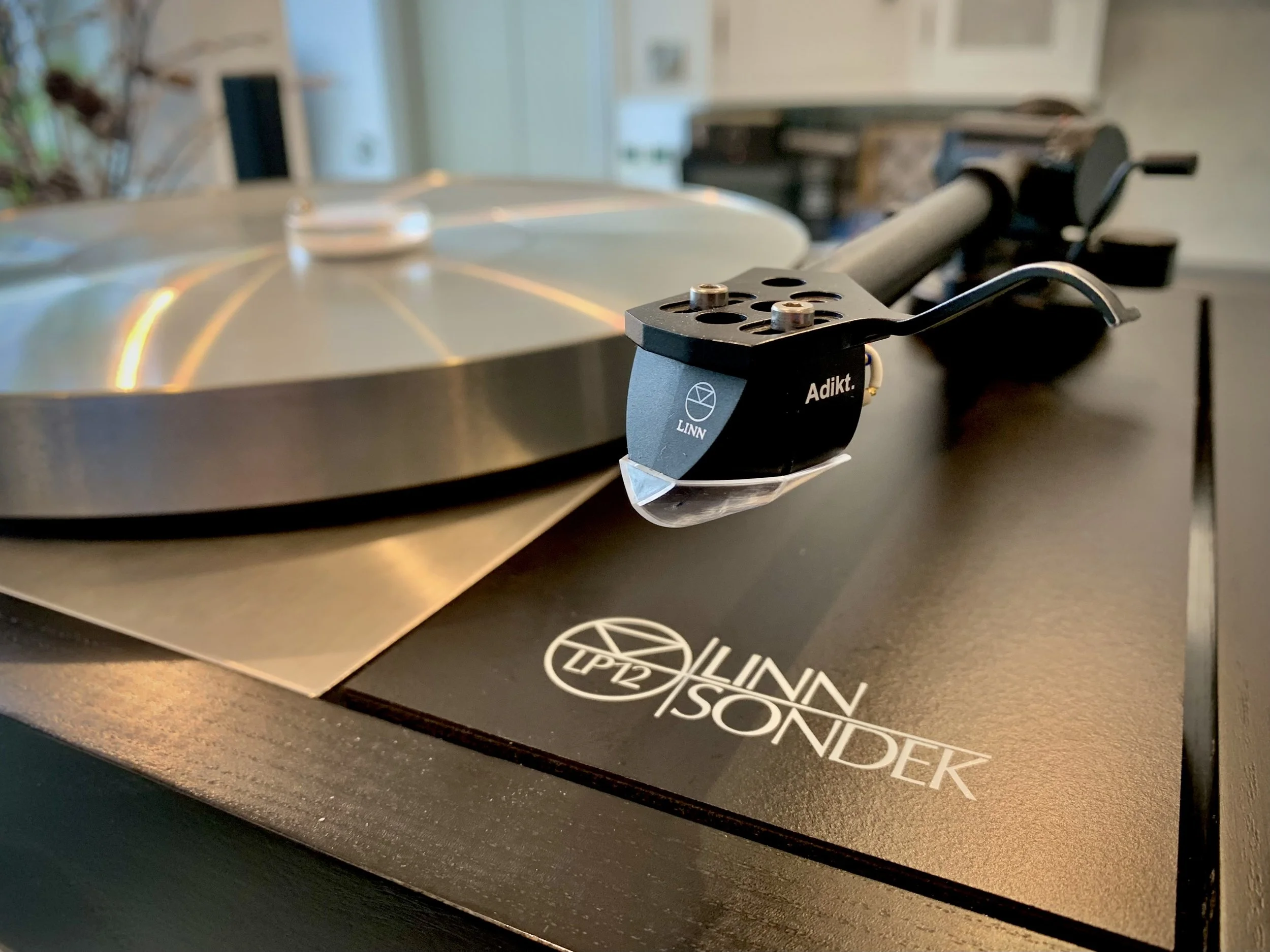 Full service and tonearm/cartridge adjustment. 