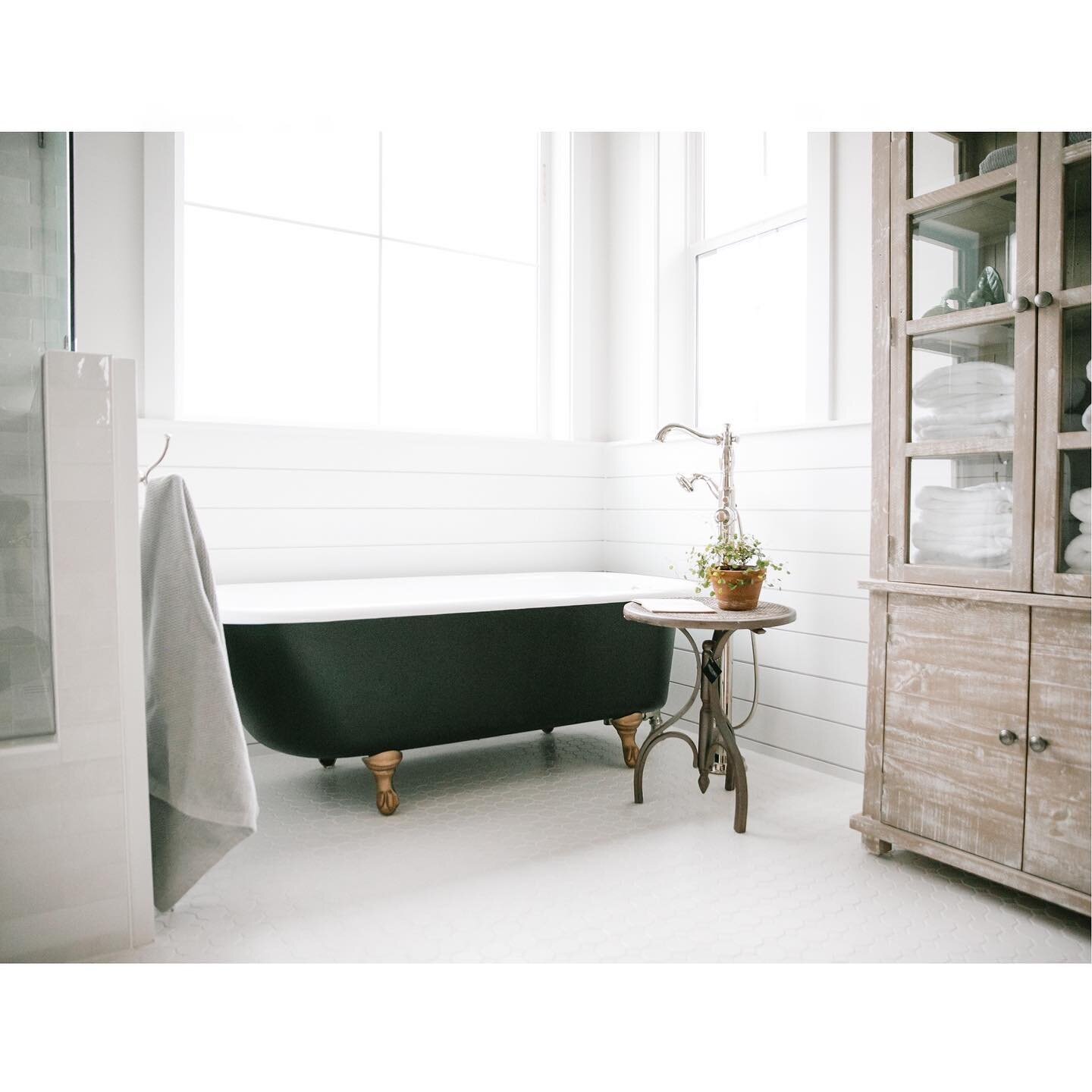 The original tub found buried in the property and the homeowner instantly knew they found their tub. Refinished to its original beauty, this was a fun way to add depth &amp;  story to this new build. 

This photo snapped by @elyseestradaphotography