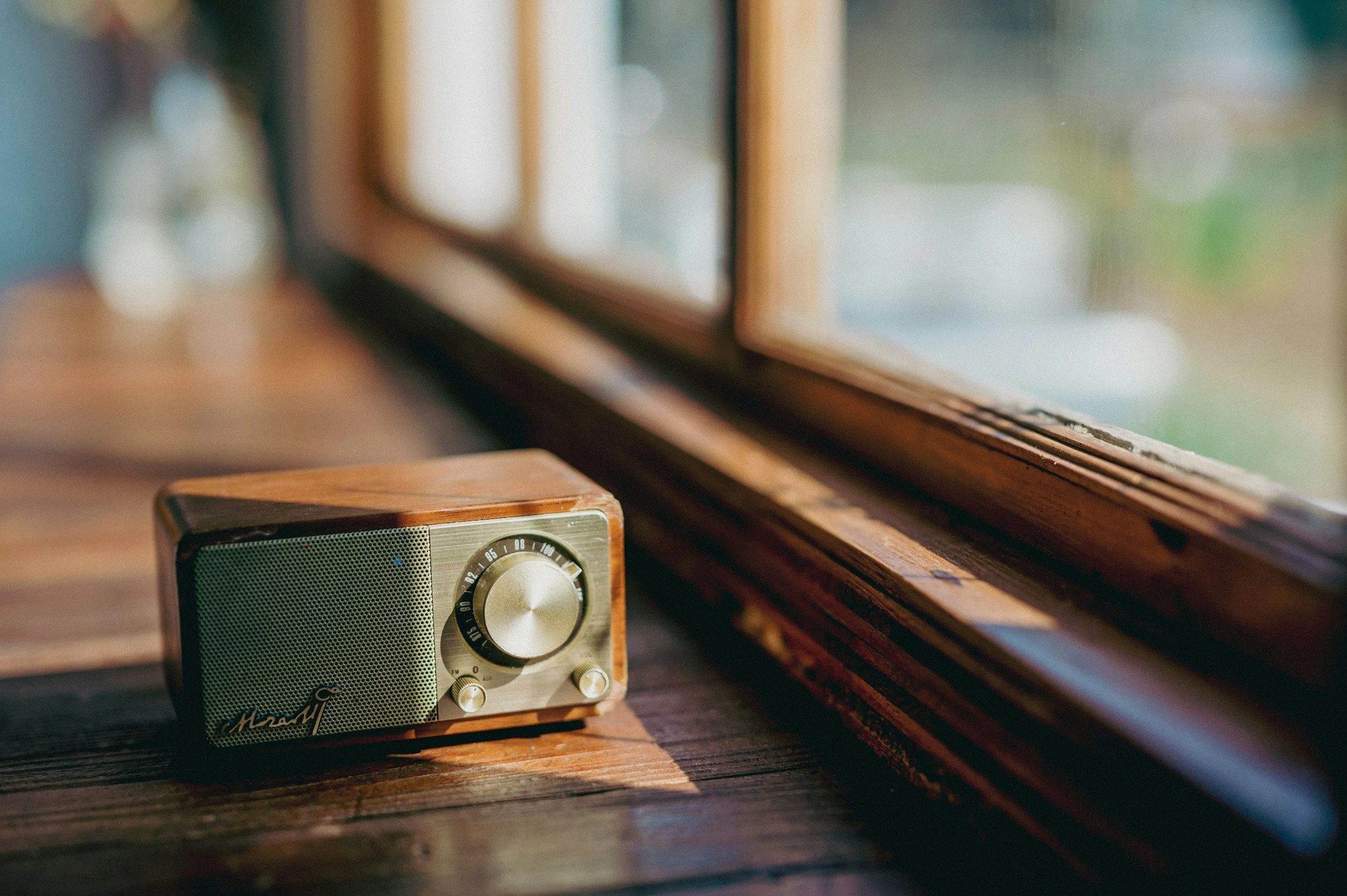 A radio sitting in a beam of sunlight – an analogy for how to tune into your complaints