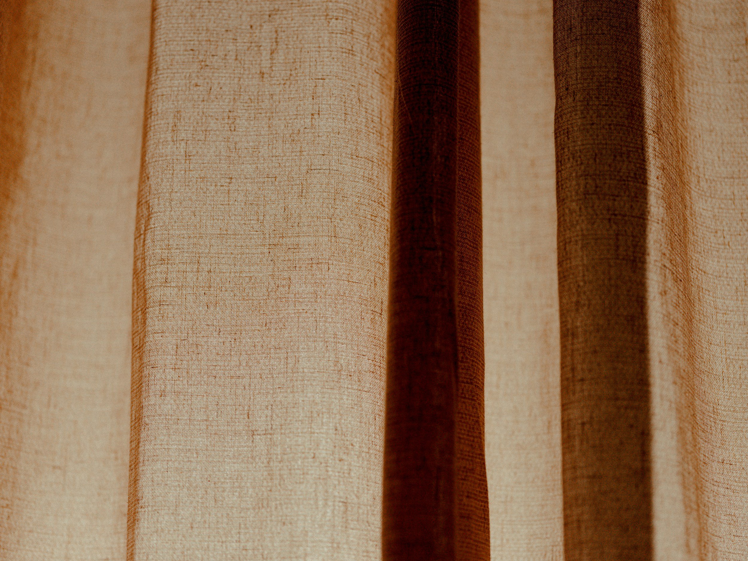 Brown linen curtains covering the sun – how it feels when complaints overcrowd our mind