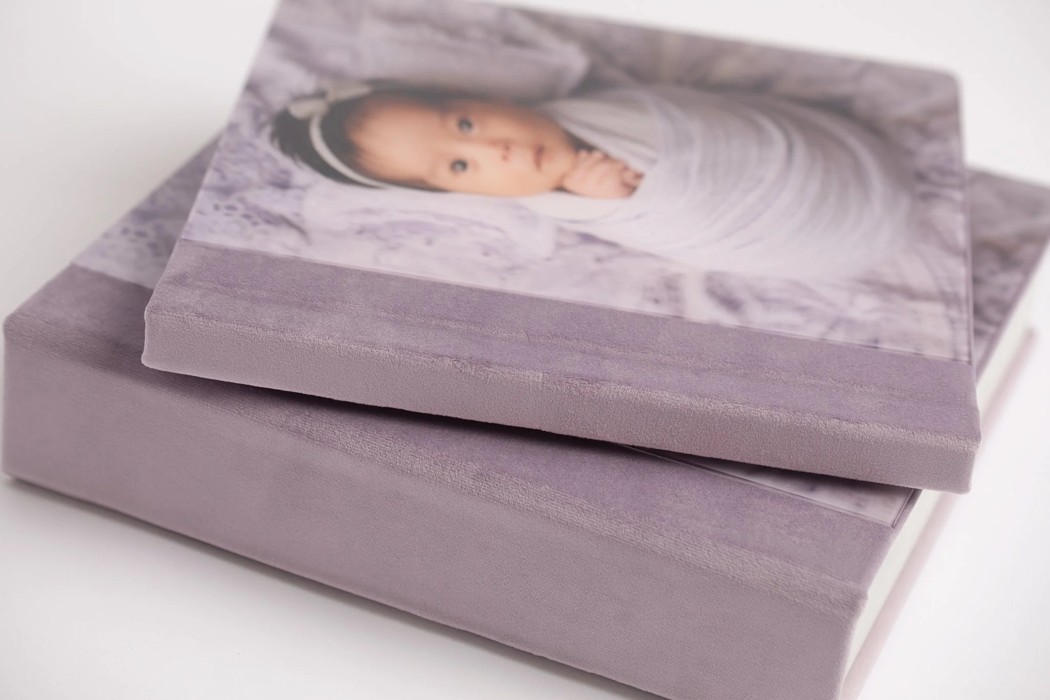 nashville newborn photographer showing newborn photo album of nashville newborn photographer session