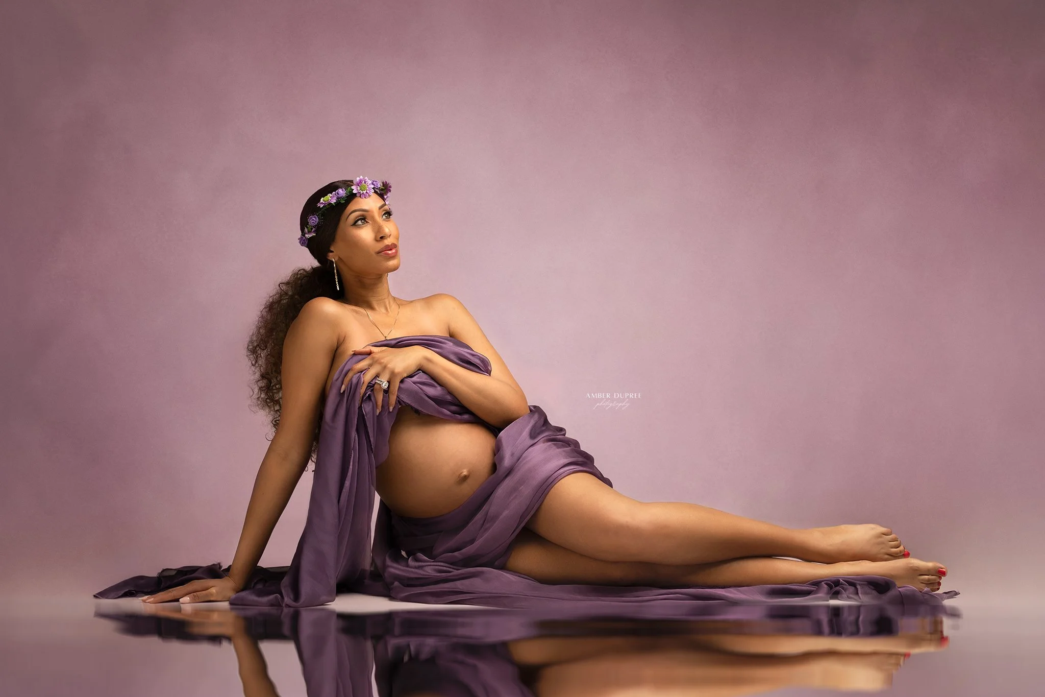 Nashville maternity photographer with mom in purple fabric