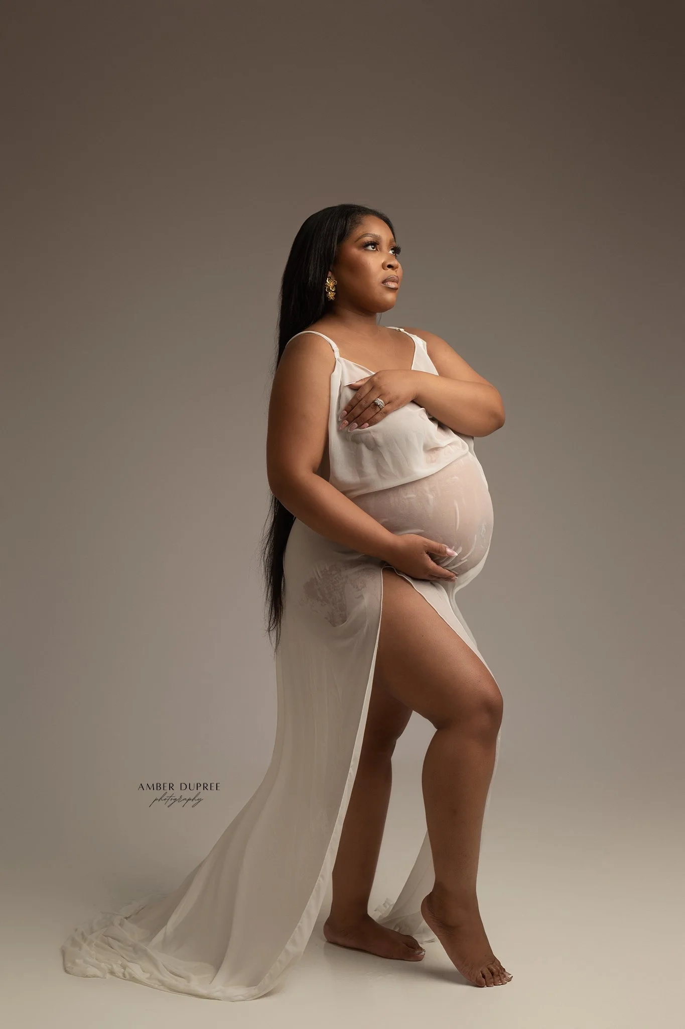 Nashville maternity photographer capturing a white backlit maternity portrait of an expecting mother