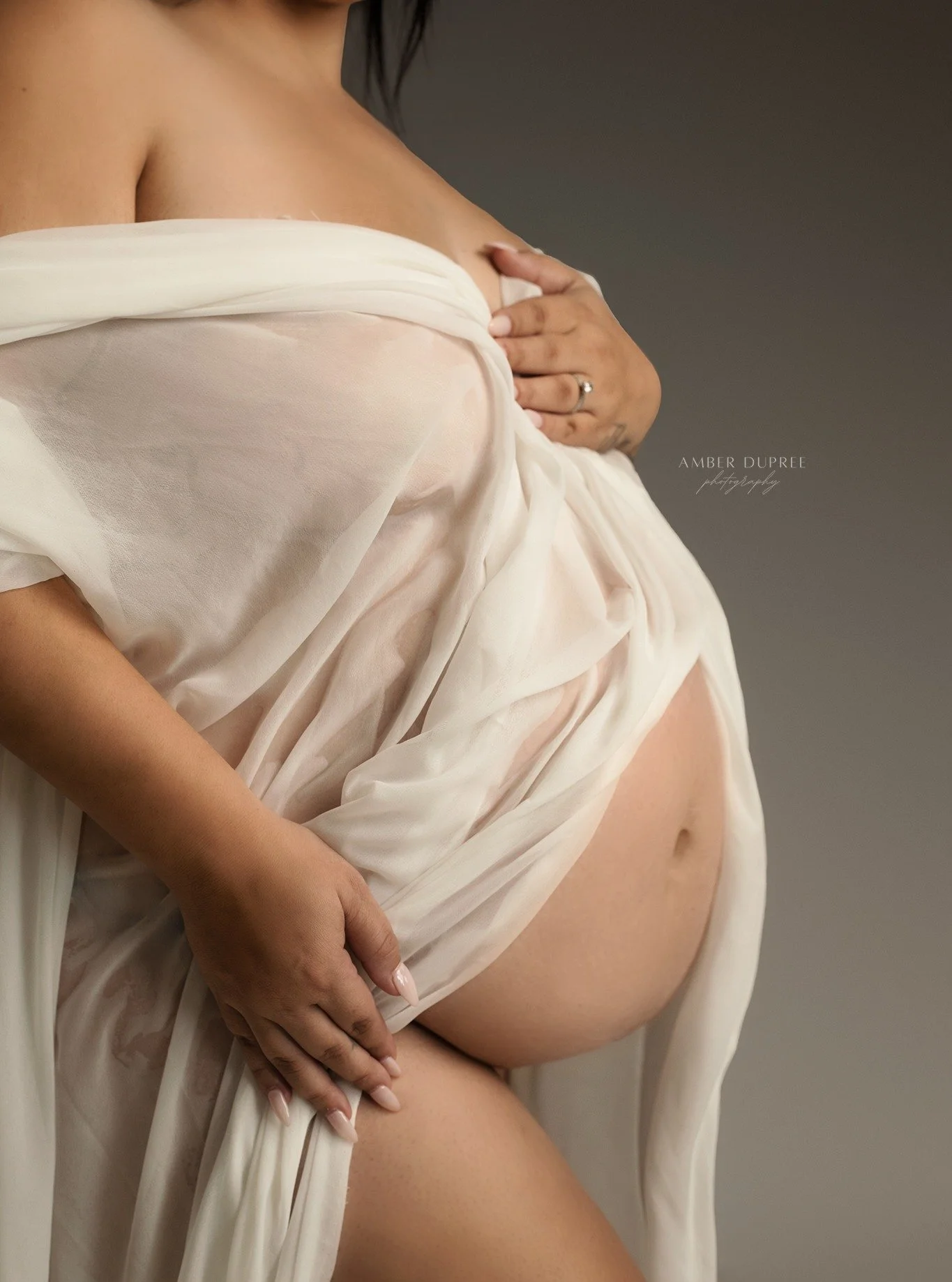This season is made of quiet moments.
The way your hands rest protectively. The way love feels deeper, softer, and somehow stronger all at once.

Maternity photos aren&rsquo;t just about waiting for a baby &mdash; they&rsquo;re about honoring the tra