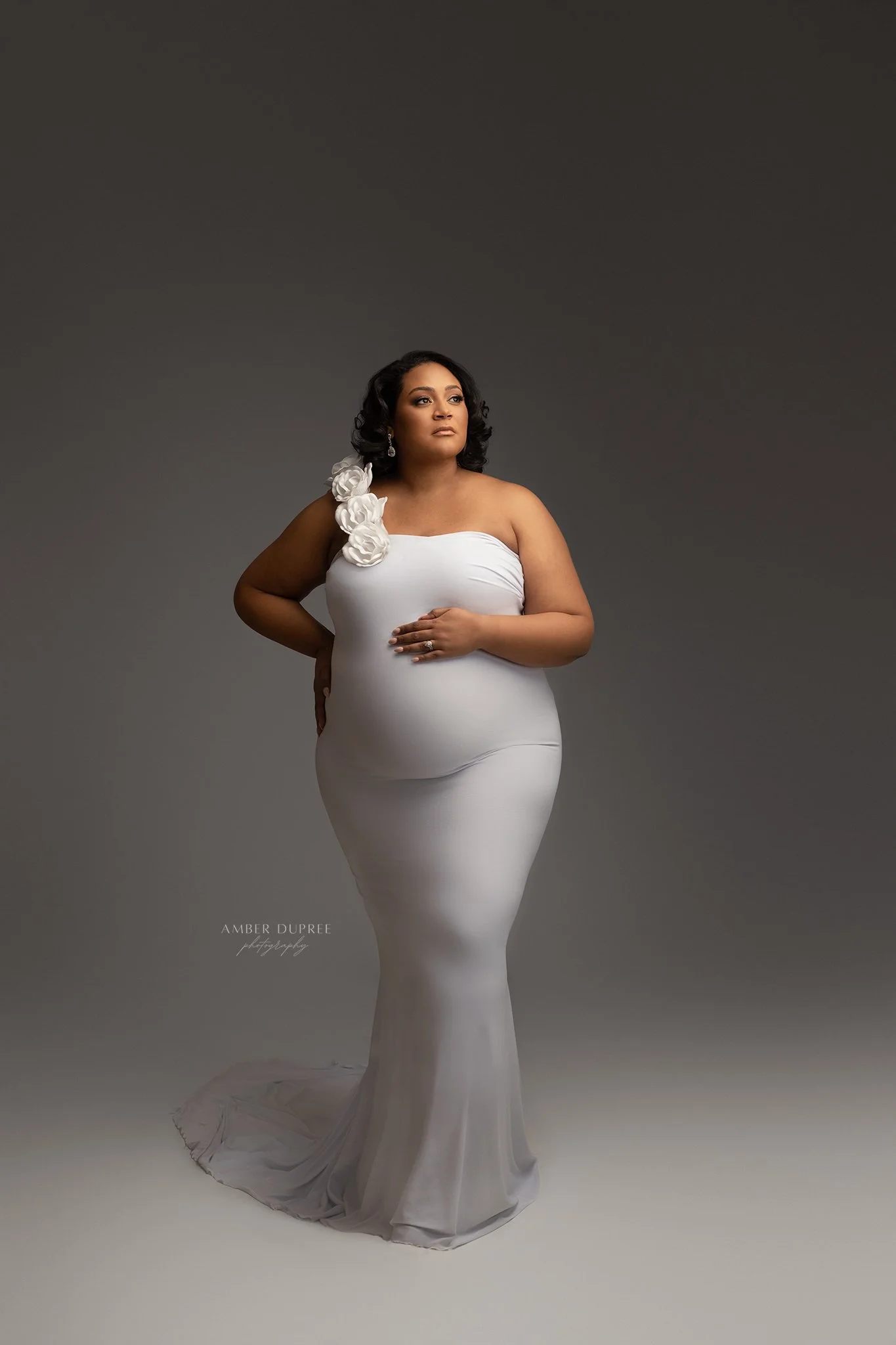 Timeless studio maternity portrait highlighting the beauty and strength of pregnancy by a Nashville maternity photographer.