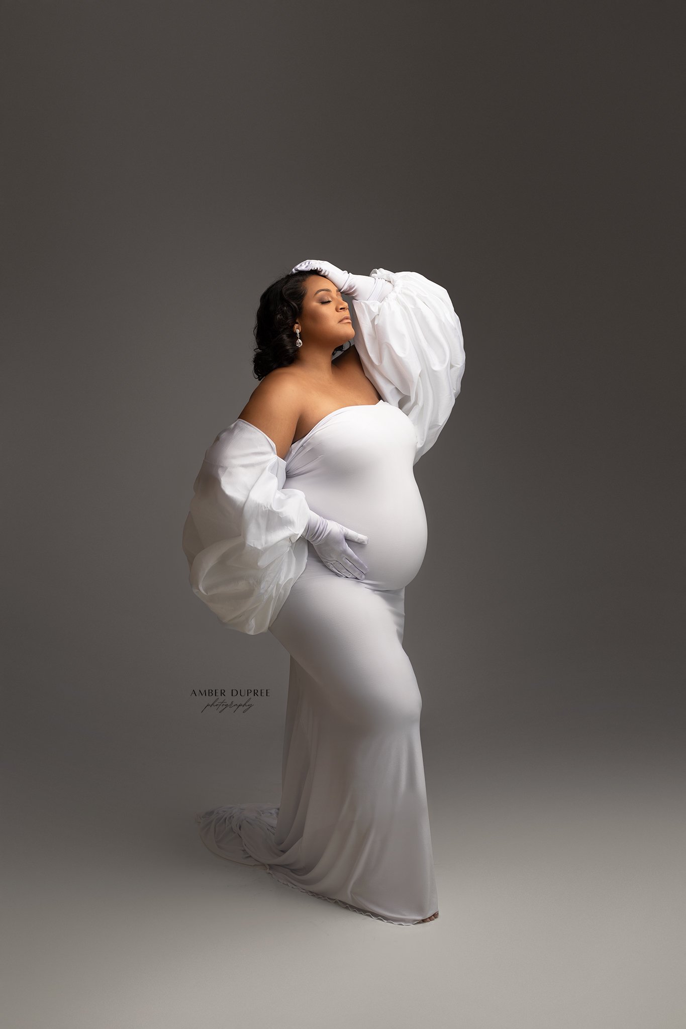 Elegant maternity portrait celebrating the strength of motherhood captured by a Nashville maternity photographer.