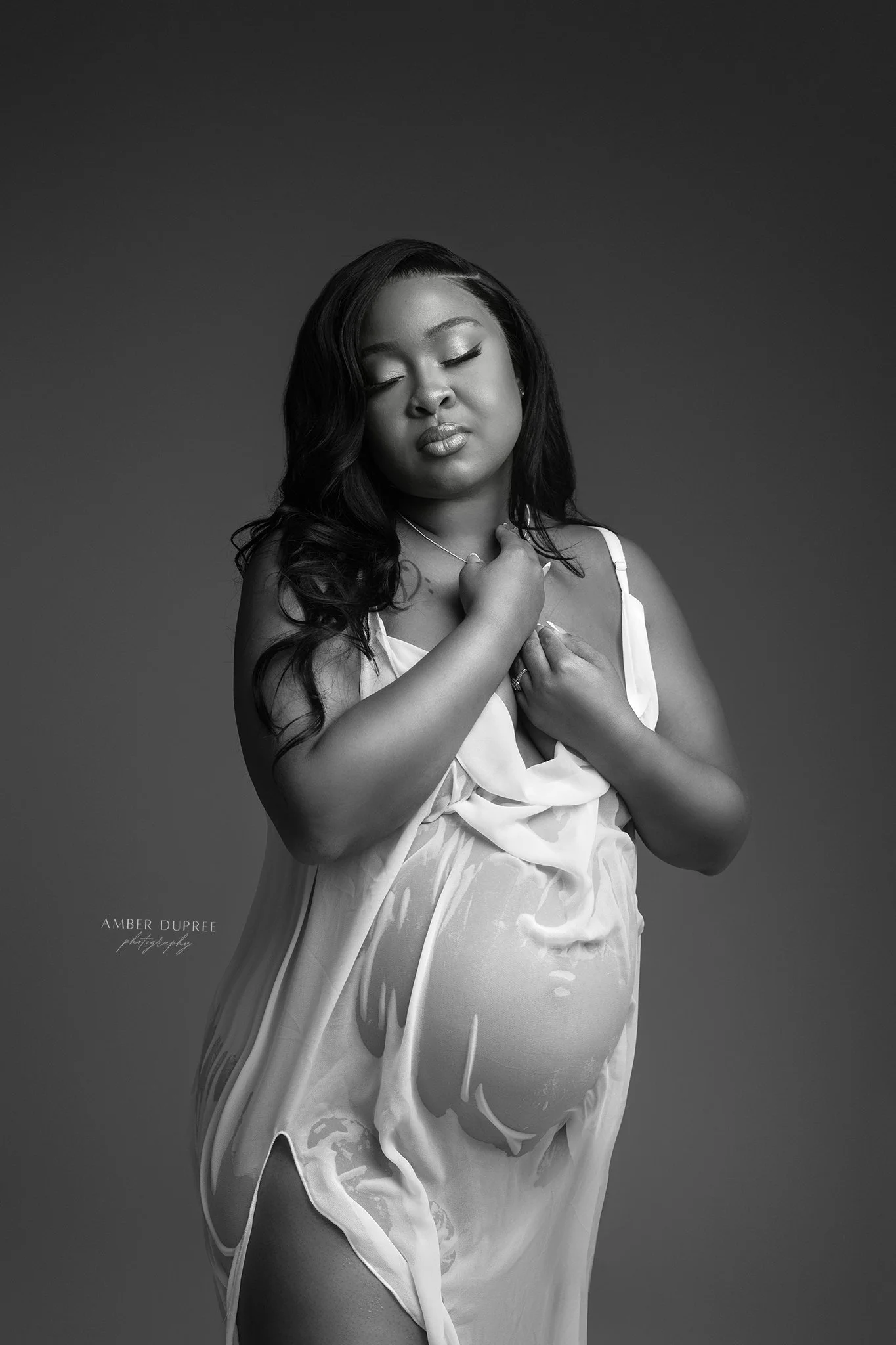 nashville maternity photographer with wet look dress maternity posing ideas