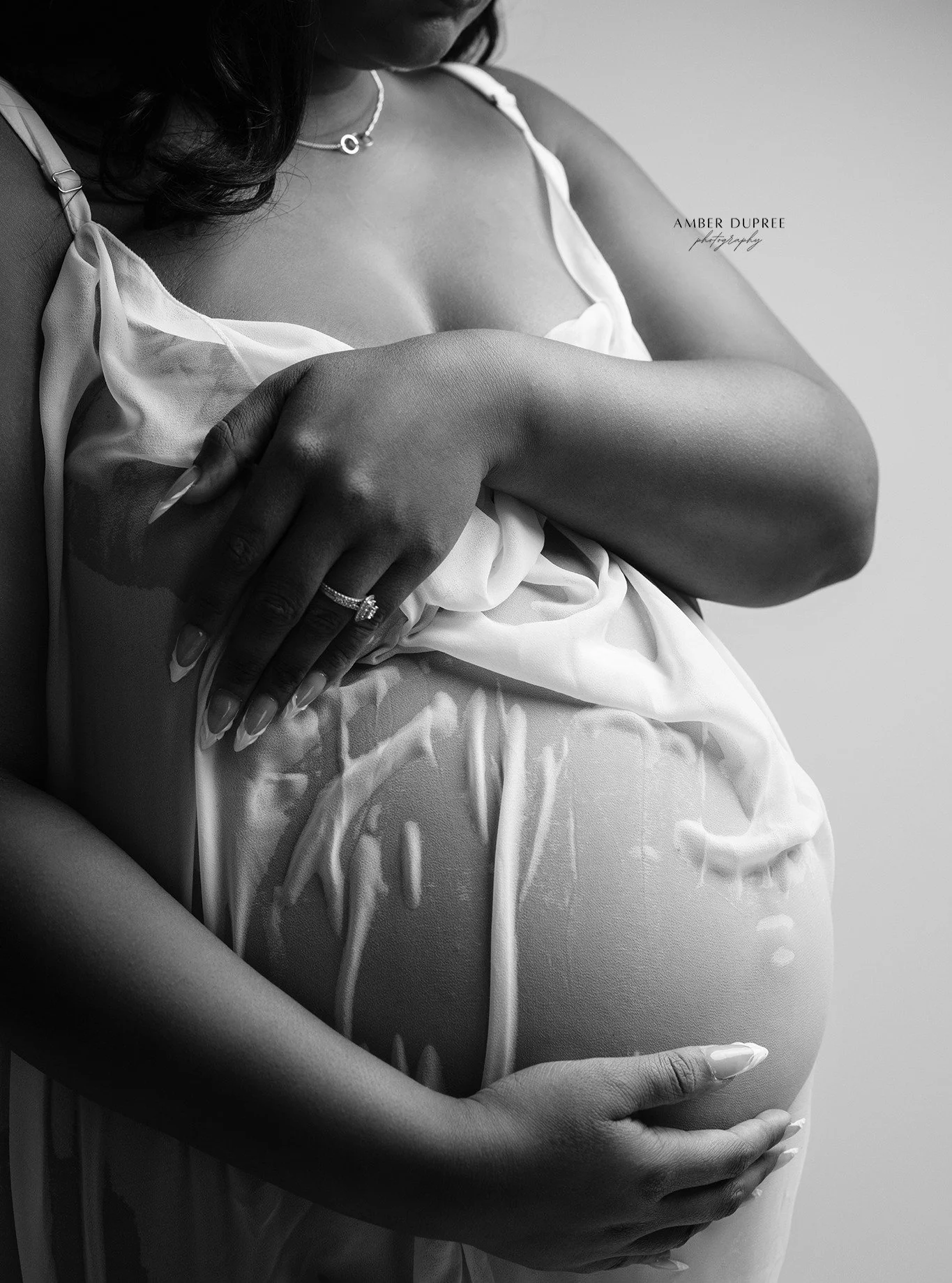 One of the most asked questions by expecting mothers is:
 &ldquo;What should I wear for my maternity photos?&rdquo;

When planning a studio maternity photoshoot in Nashville, wardrobe plays a powerful role in creating refined, timeless portraits.

He