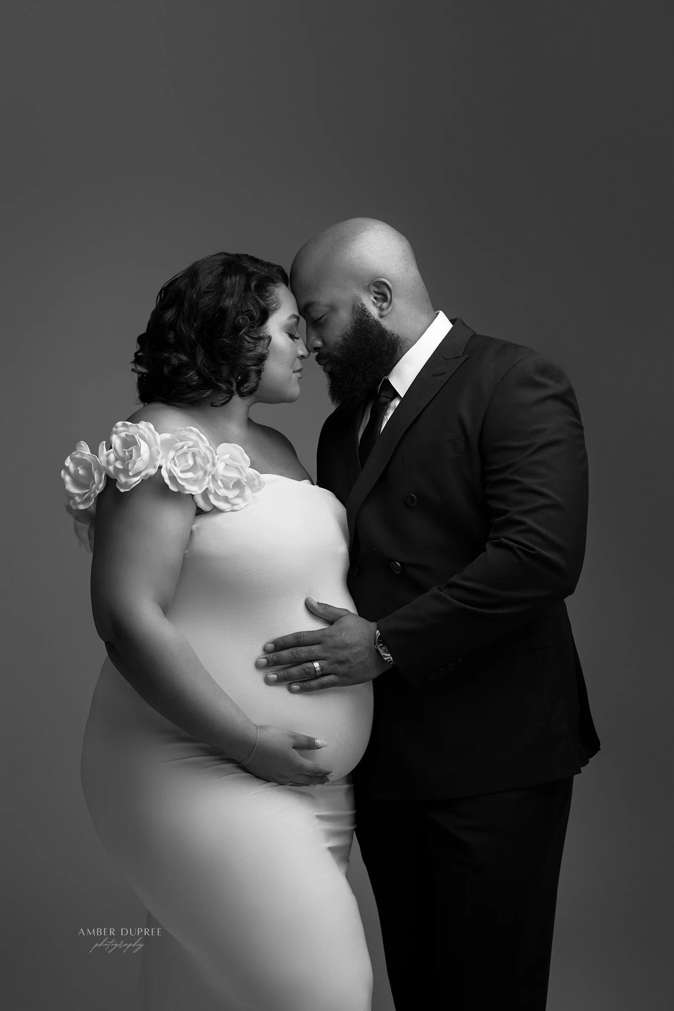 luxury maternity session nashville couple standing portrait with elegant wardrobe