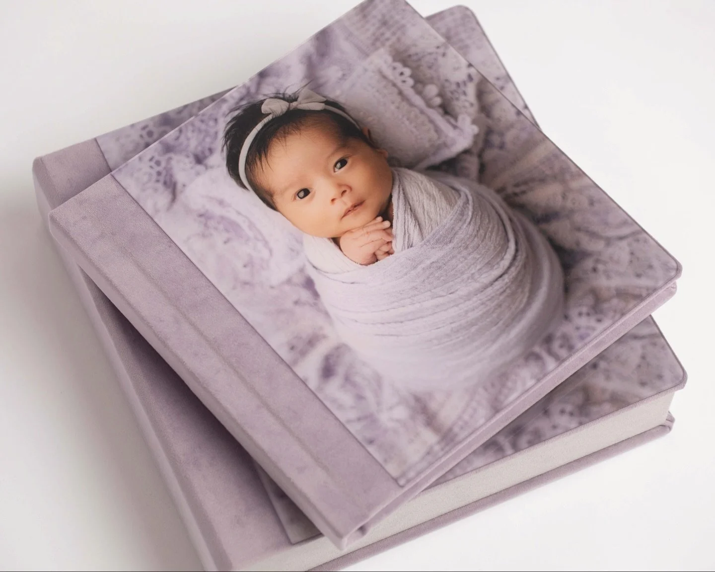 These acrylic heirloom albums are a perfect way to look back on your little one&rsquo;s photos. Helping time hold still as they quickly grow right before your eyes. #nashvillenewbornphotographer #nashvillephotoshoot #newbornphotographer #photoalbum #