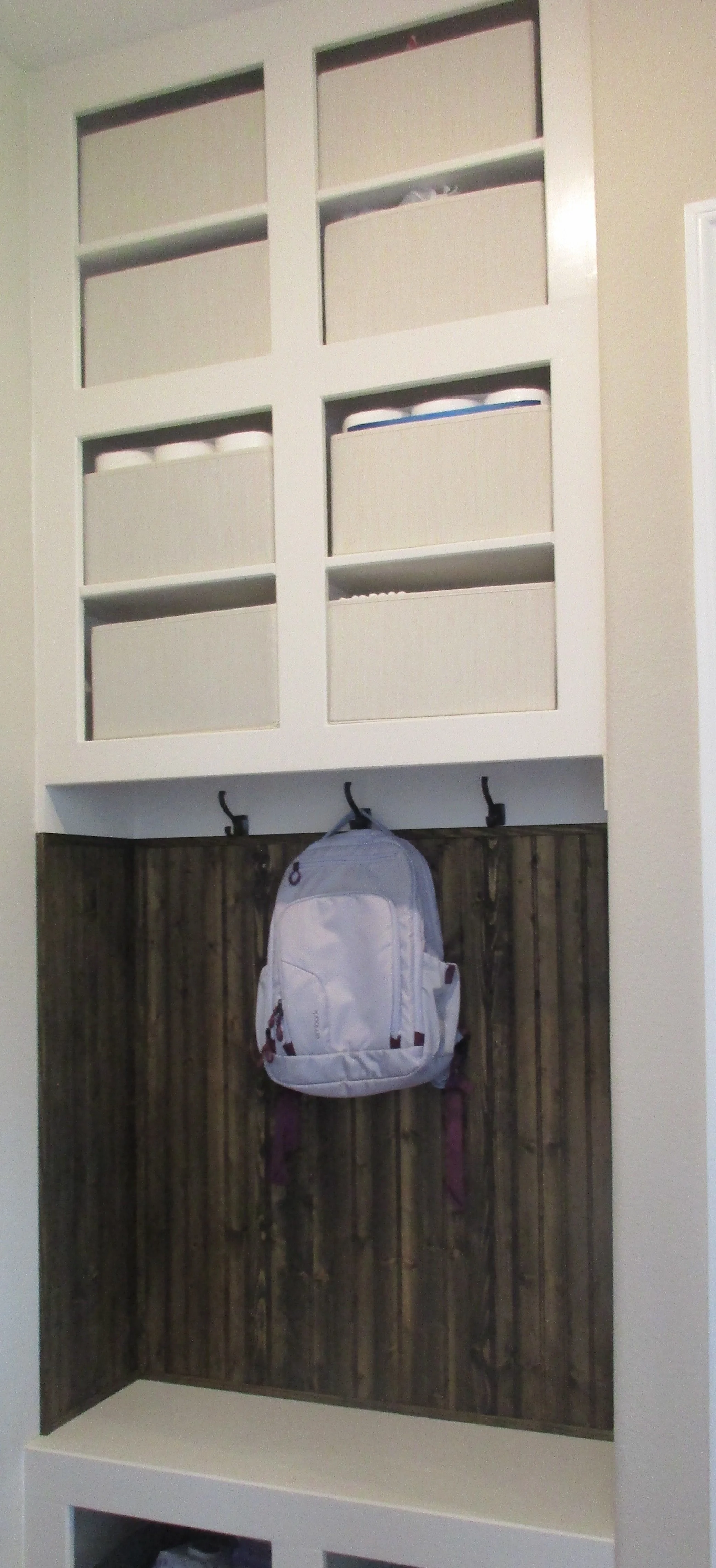 Storage cubbies and bead board accent