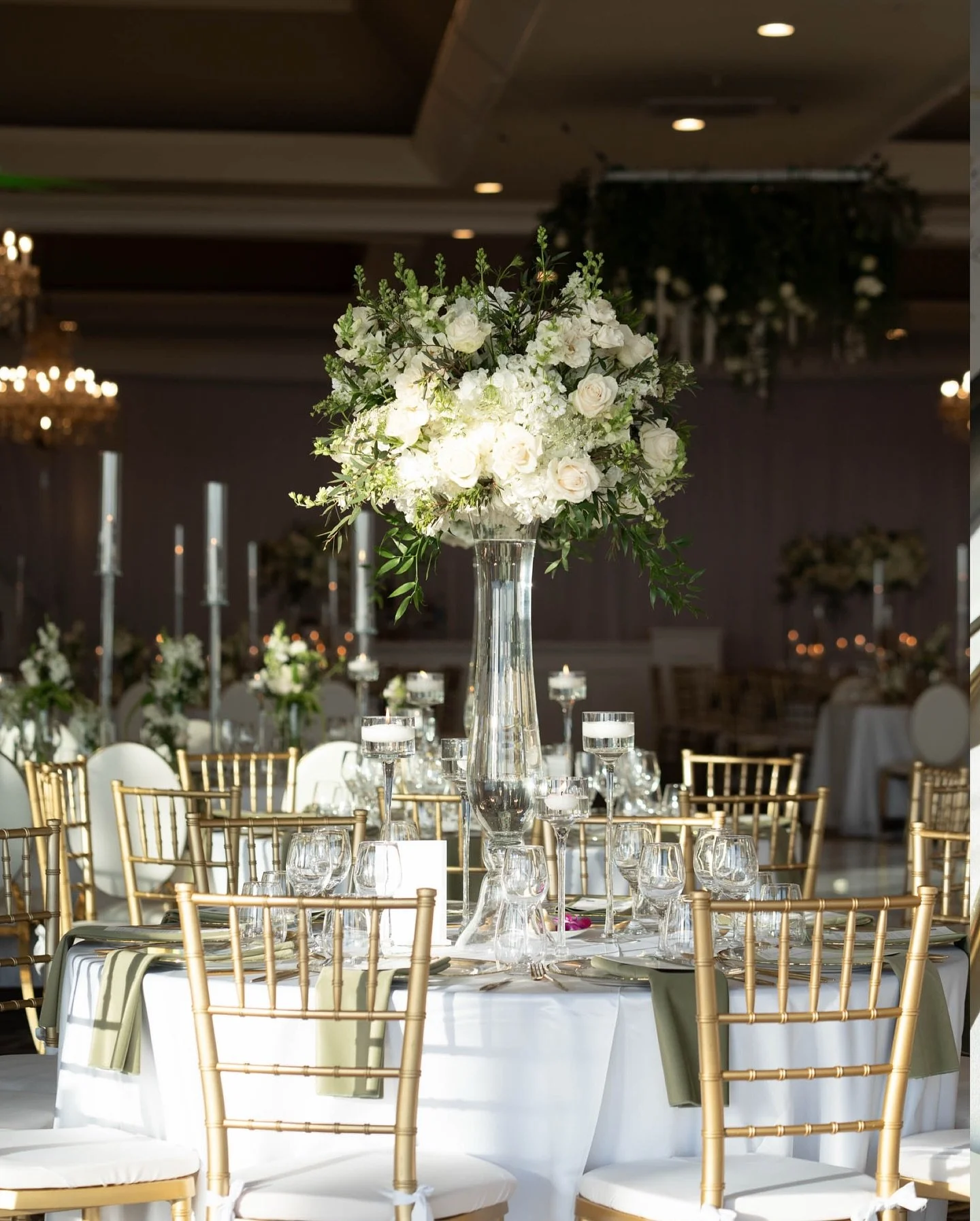 Timeless elegance, redefined. ✨

A breathtaking blend of classic white florals, lush greenery, and golden details transformed this ballroom into a wedding dreamscape. From the round tables details to the long table florals, every setting was designed