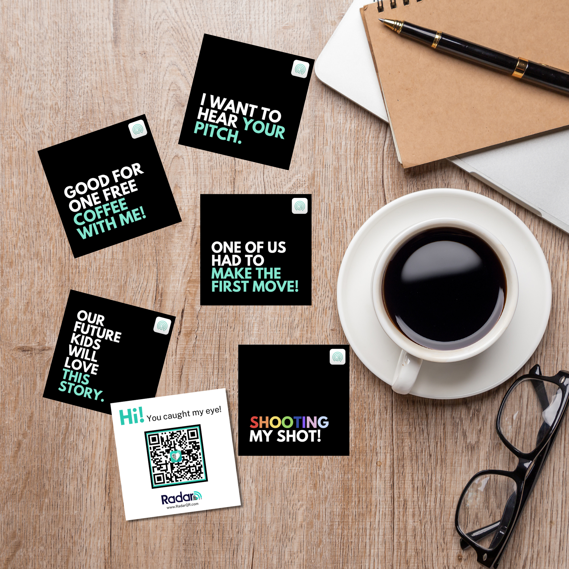 Flat lay of black flyers with bold white and teal text on a wooden table, including phrases like "I want to hear your pitch," "Good for one free coffee with me," and "Shooting my shot!" alongside a white coffee cup, a pair of black eyeglasses, a brown notebook with a black pen, a white paper, and a QR code flyer.