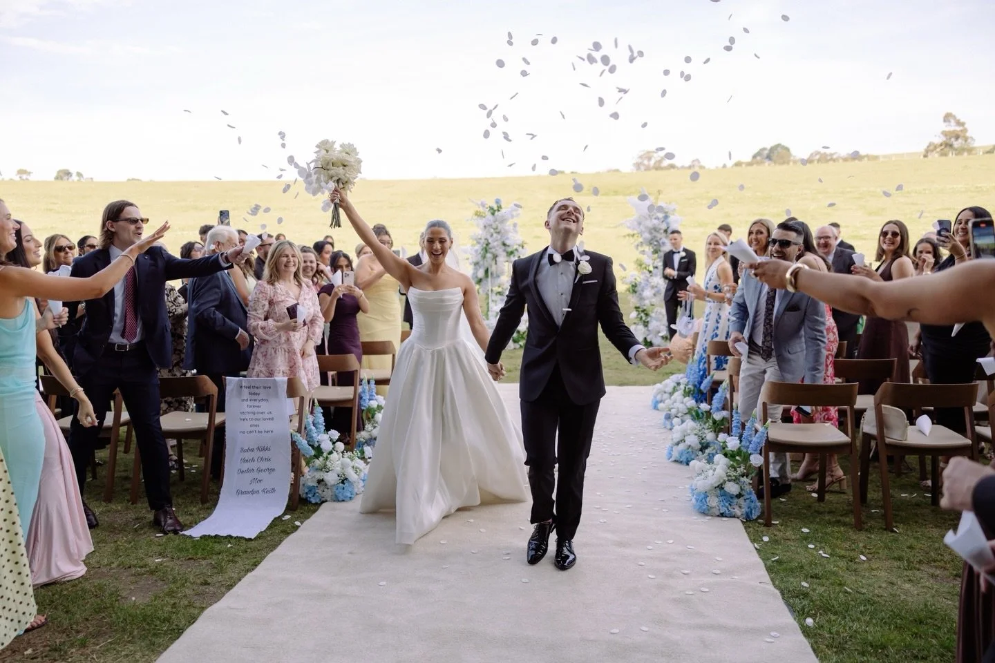 At Hubert&rsquo;s Estate, dressed in their best. Hearts full of love, Harry and Taylah confessed.
Forever feels easy, standing side by side.
The magic of the day sparkled, joy they couldn&rsquo;t hide. 

Guests cheer; confetti flew,
Happy tears spark