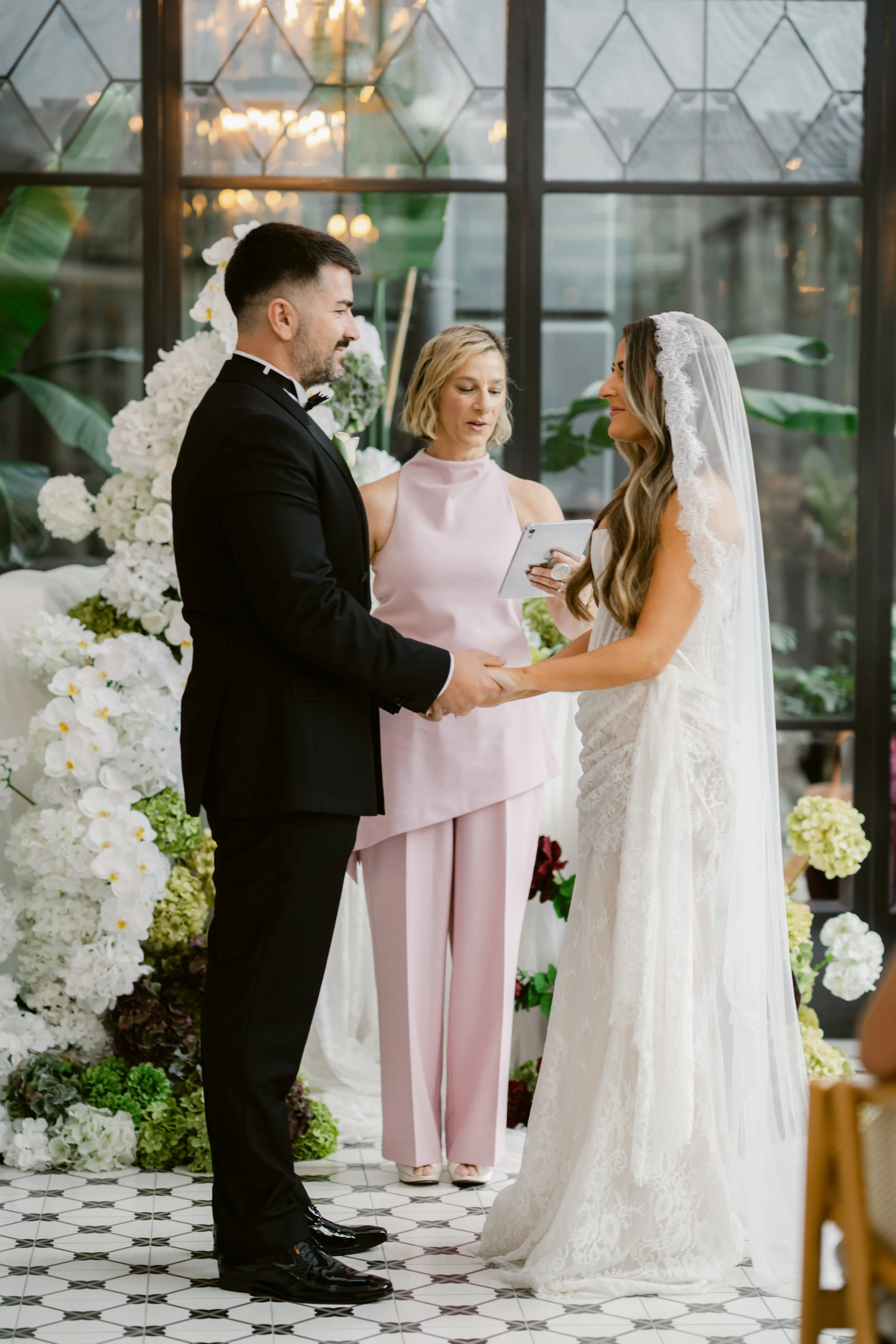 Melbourne Marriage celebrant OLIVIA FERRARO at the Royce Hotel on St Kilda road marrying in an intimate ceremony In the terrace space an intimate micro wedding ceremony