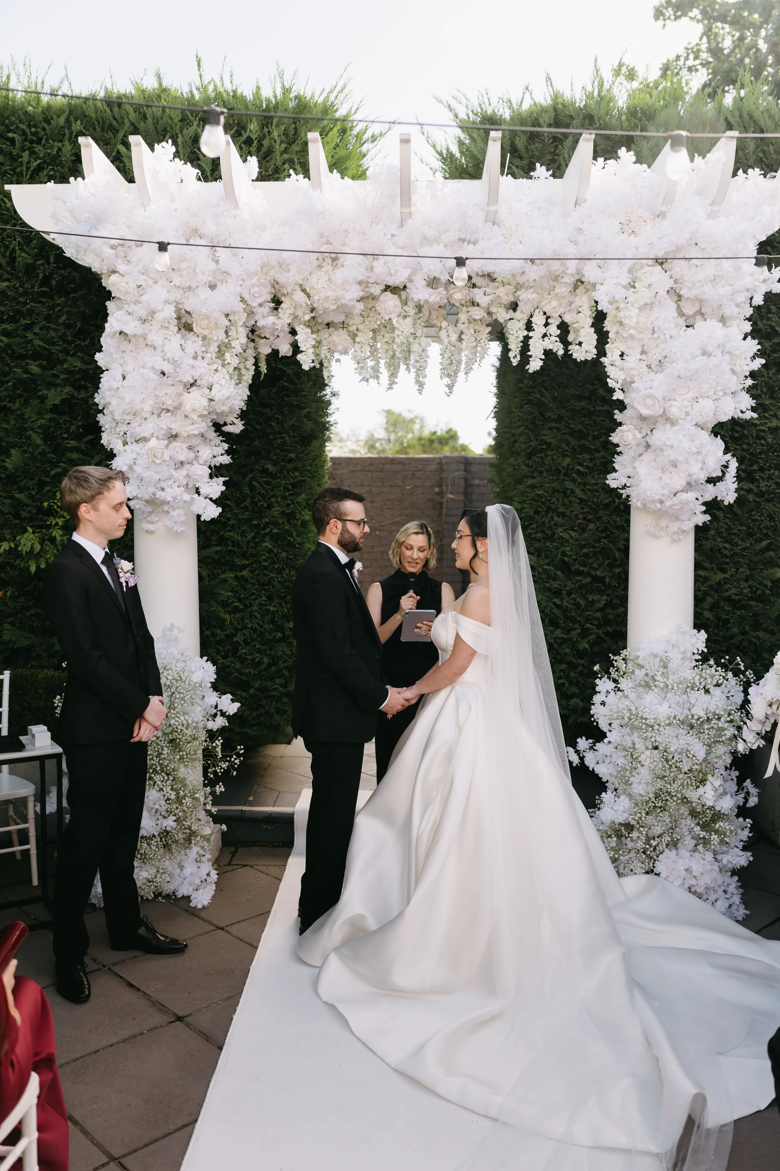 Melbourne marriage celebrant Olivia Ferraro conducting a wedding marriage at Huntley House Elsternwick