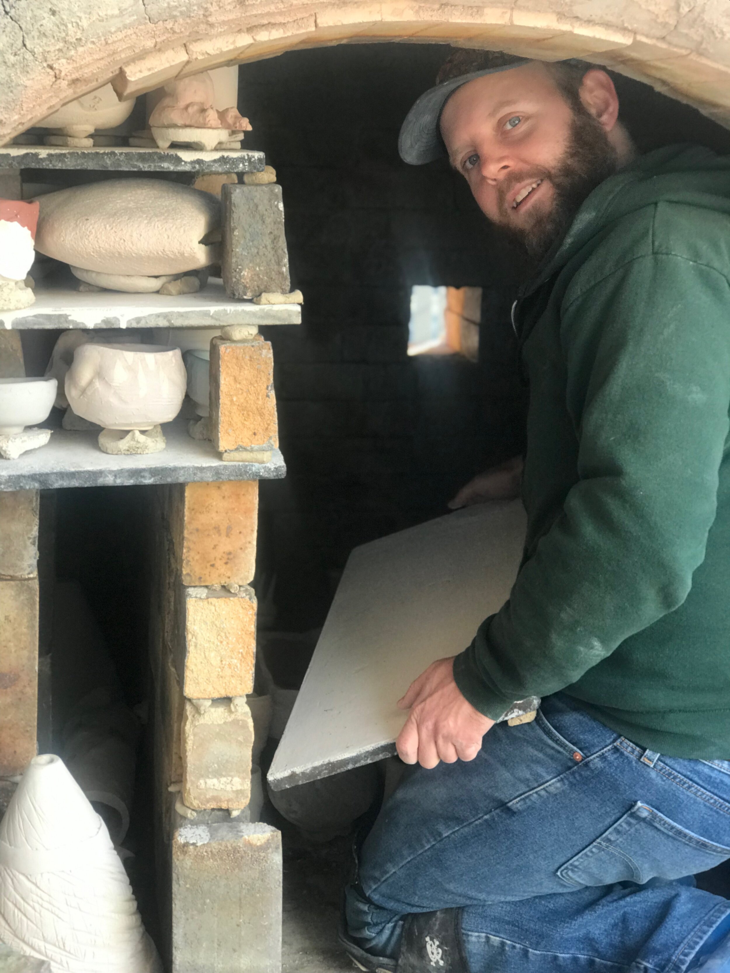 Loading the shelves into the train kiln