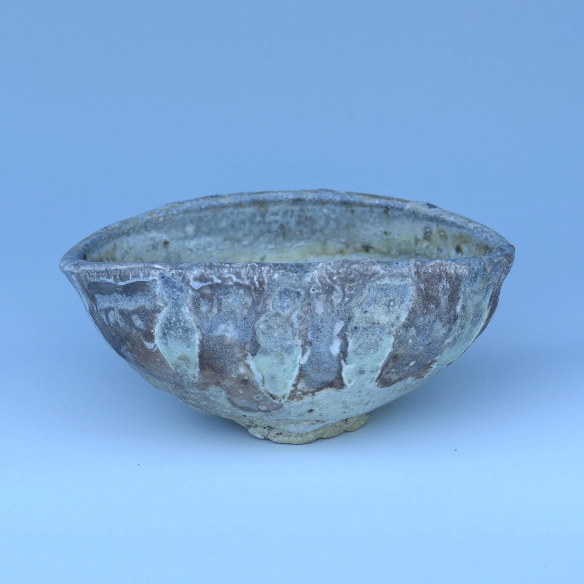This teabowl has a really satisfying shape and weight, and it feels great to hold and drink from. I especially love the soft green that came through in the clay. It is not the most common result from my porcelain, but it is probably my favorite.

I h