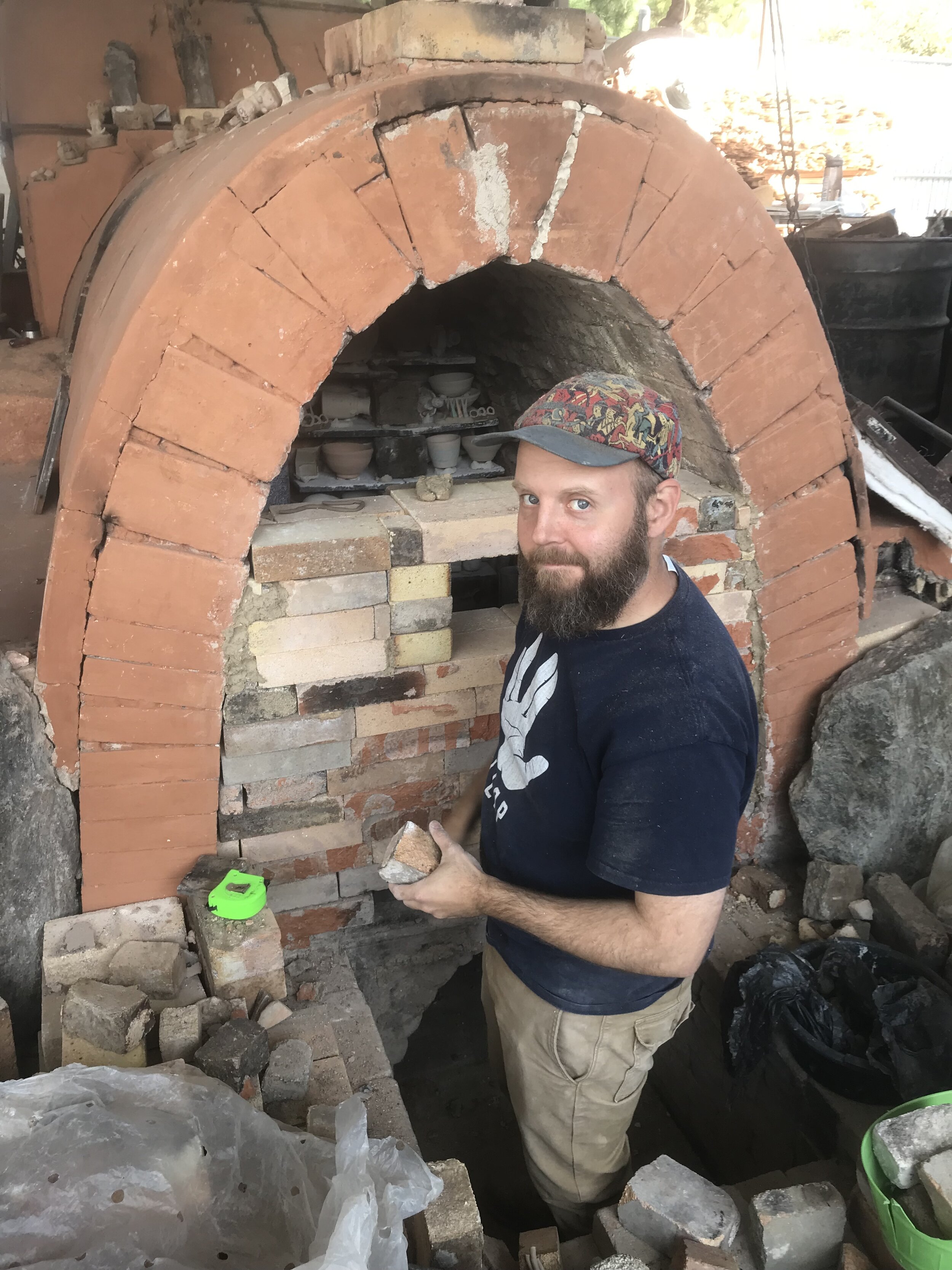 Bricking up the door of the anagama kiln