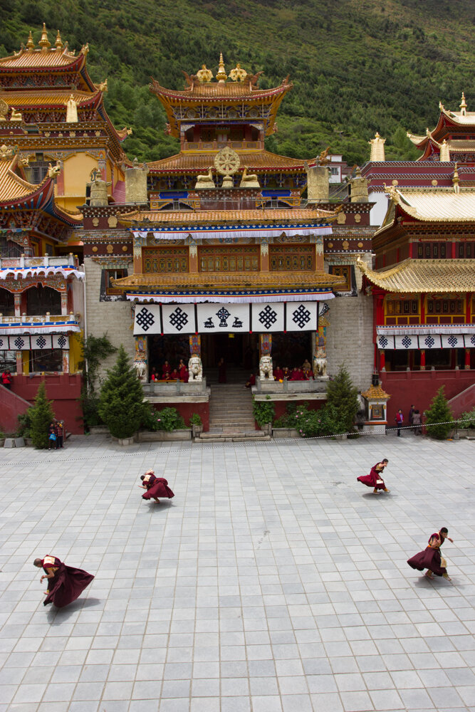 Monks performing at Nanwu Temple during Buddha's Birthday - Kangding, Sichuan Province