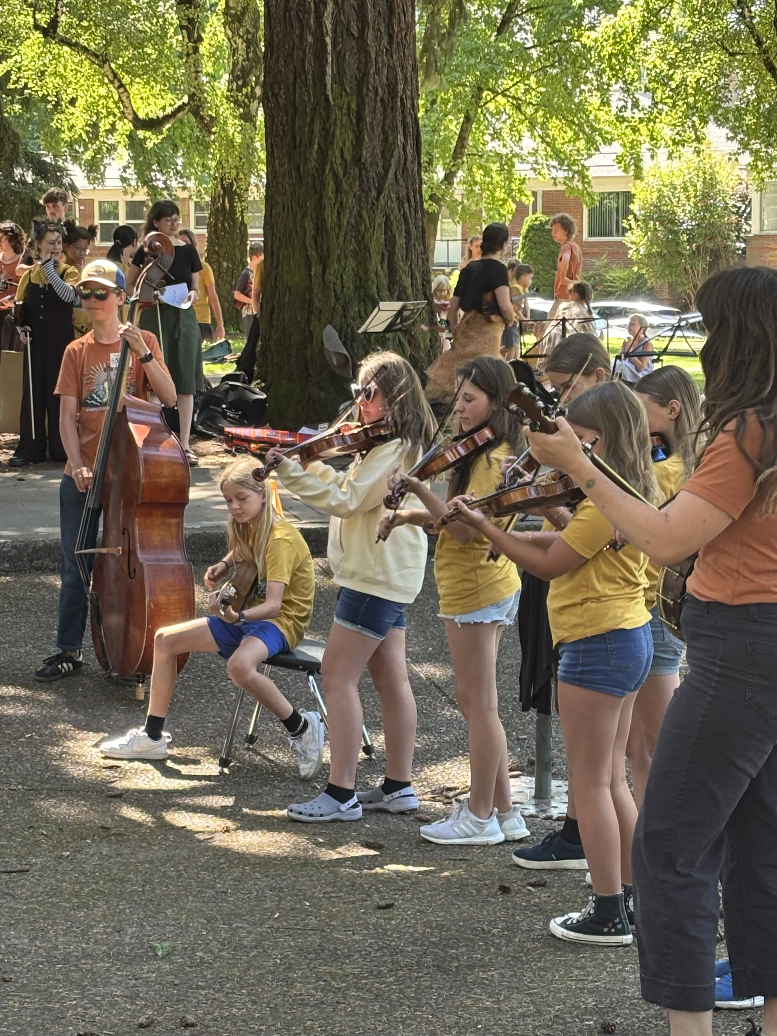 Teacher Gabby leads her advanced Old Time group