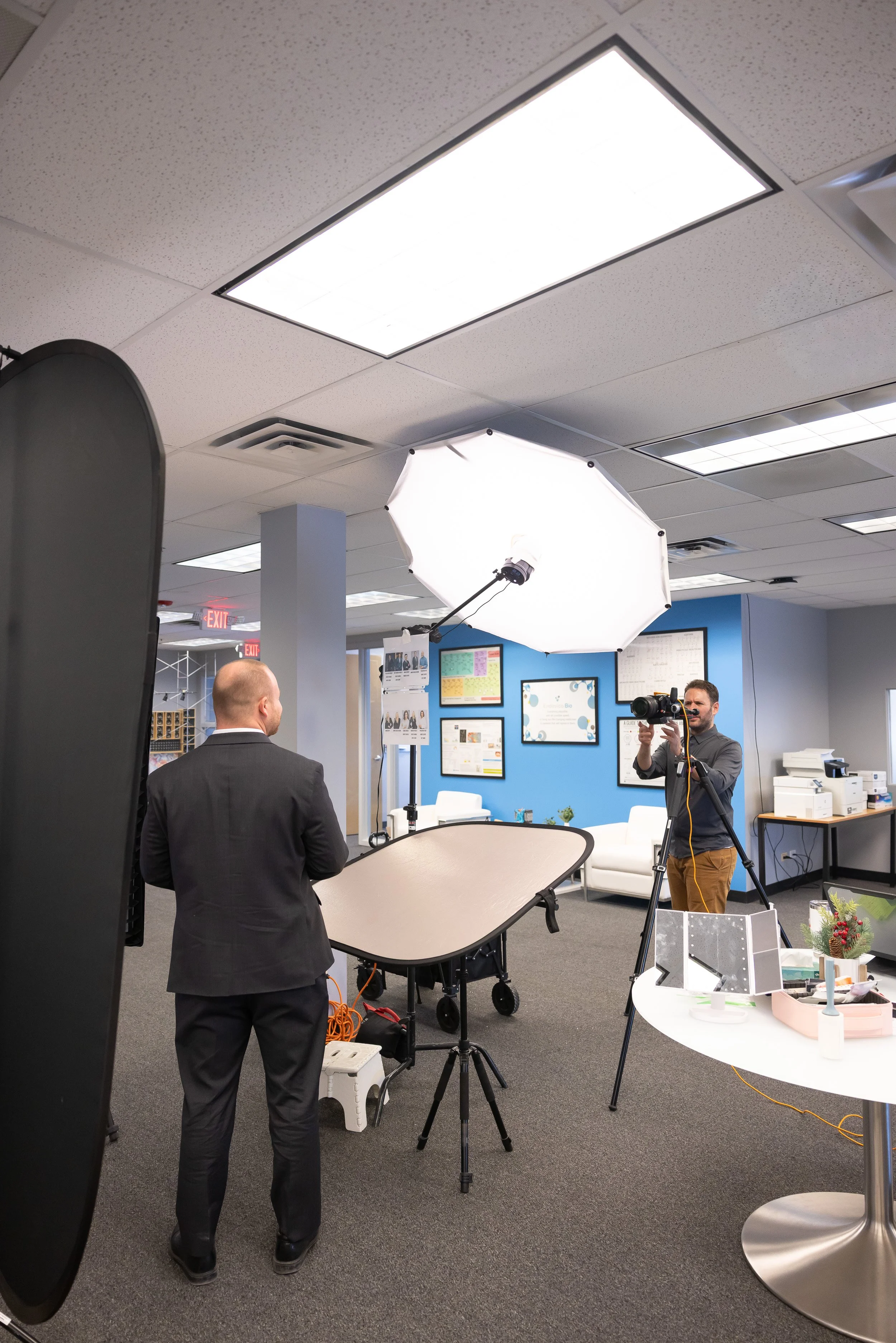 professional headshot lighting setup in a corporate office