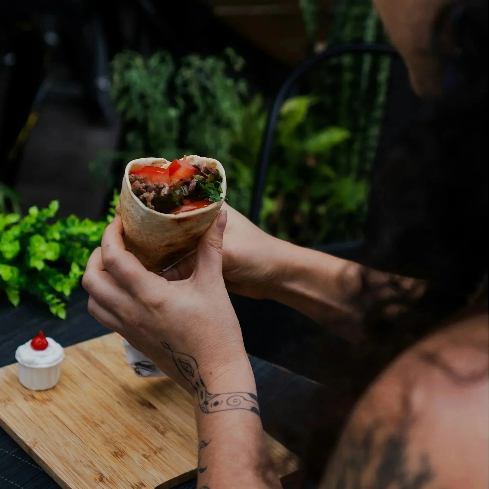 Geometric drawing of an outline square with sections divided by vertical, horizontal, and diagonal lines.