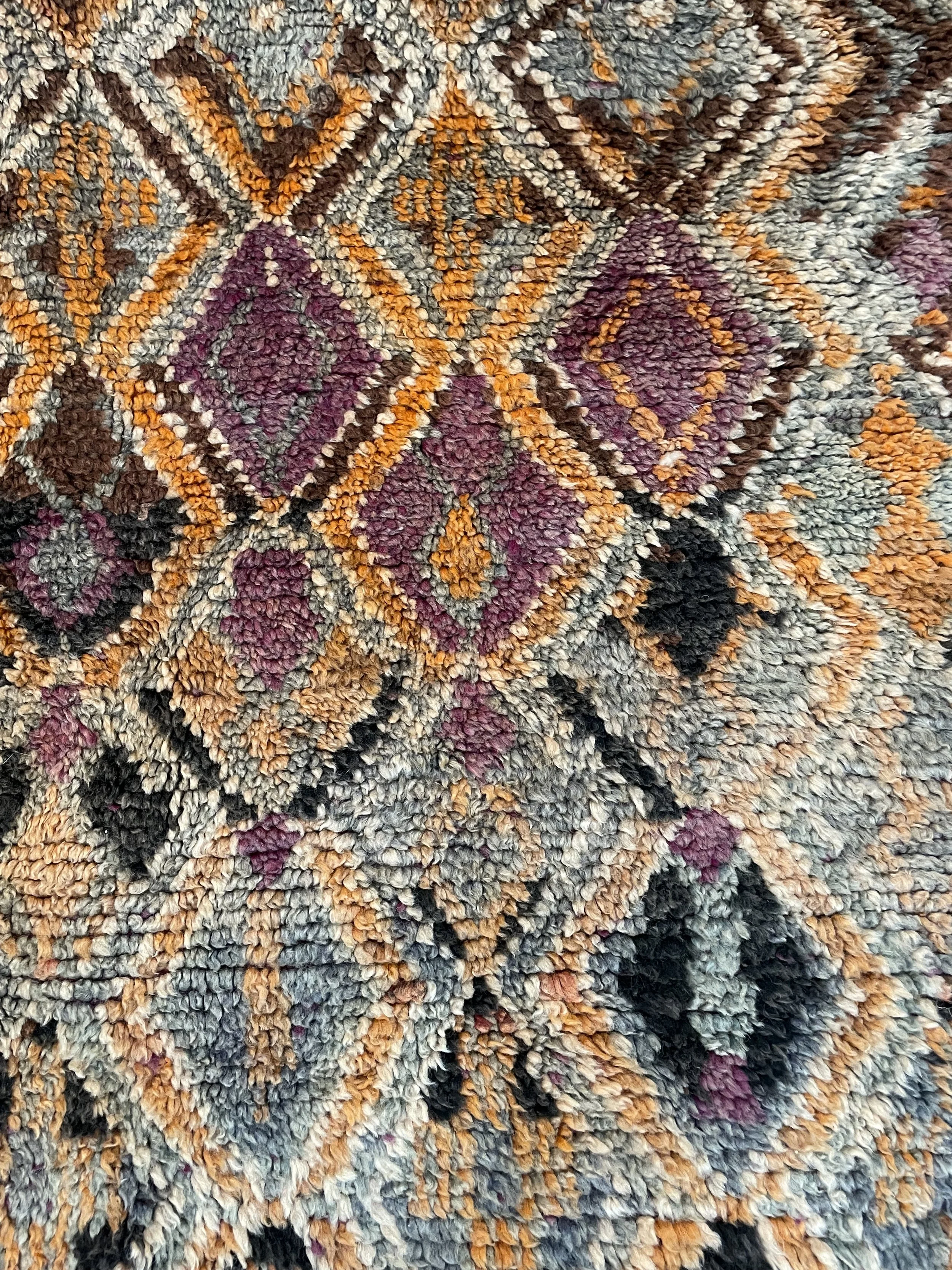 Vintage Talsint Moroccan Rug midcentury with purples navy orange geometric pattern 7x11