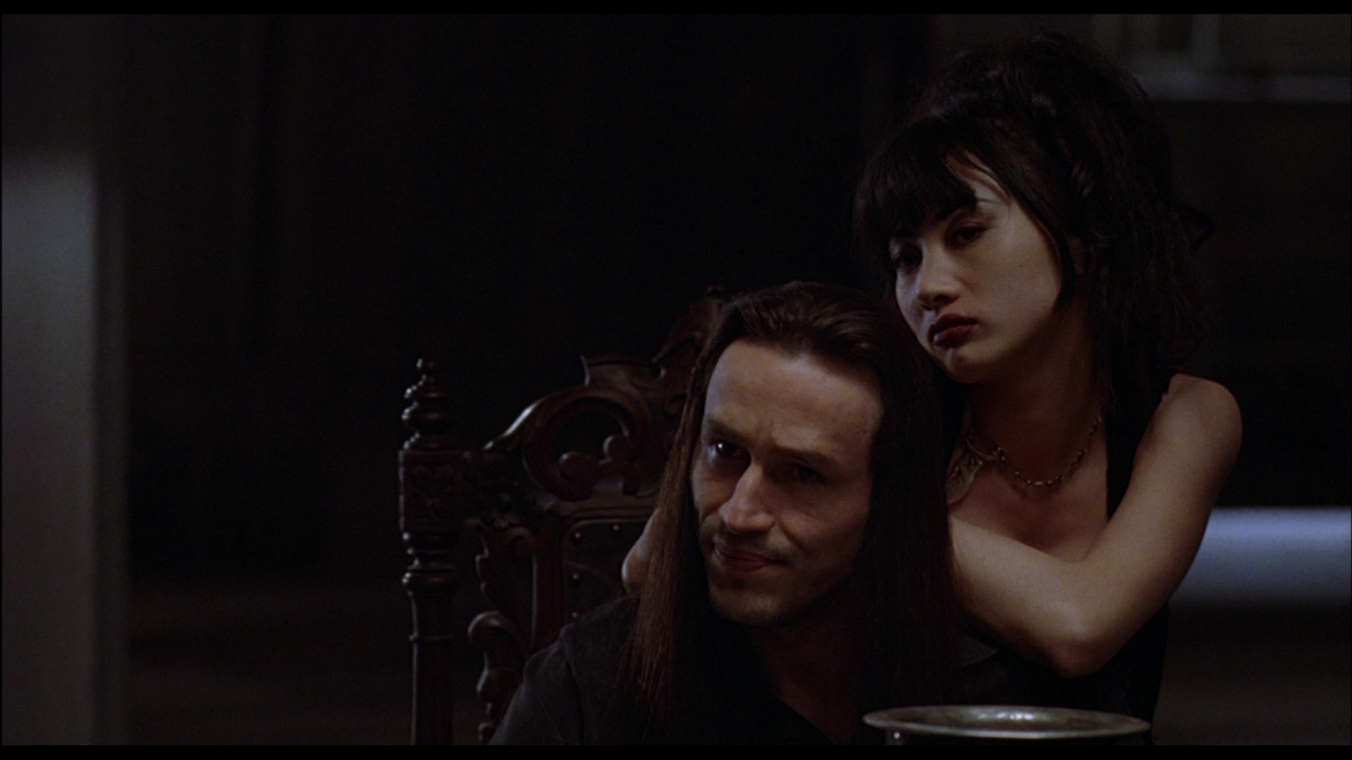 Michael Wincott as Top Dollar and Bai Ling as Myca in The Crow