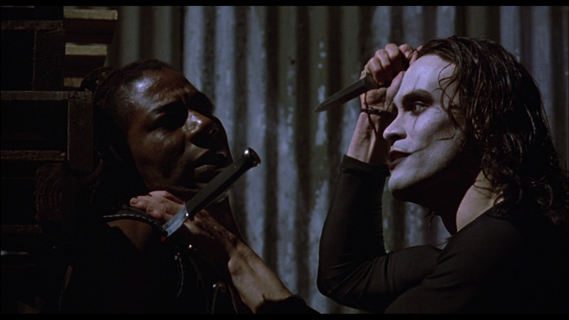 Laurence Mason as Tin Tin and Brandon Lee as Eric Draven in Alex Proyas' The Crow