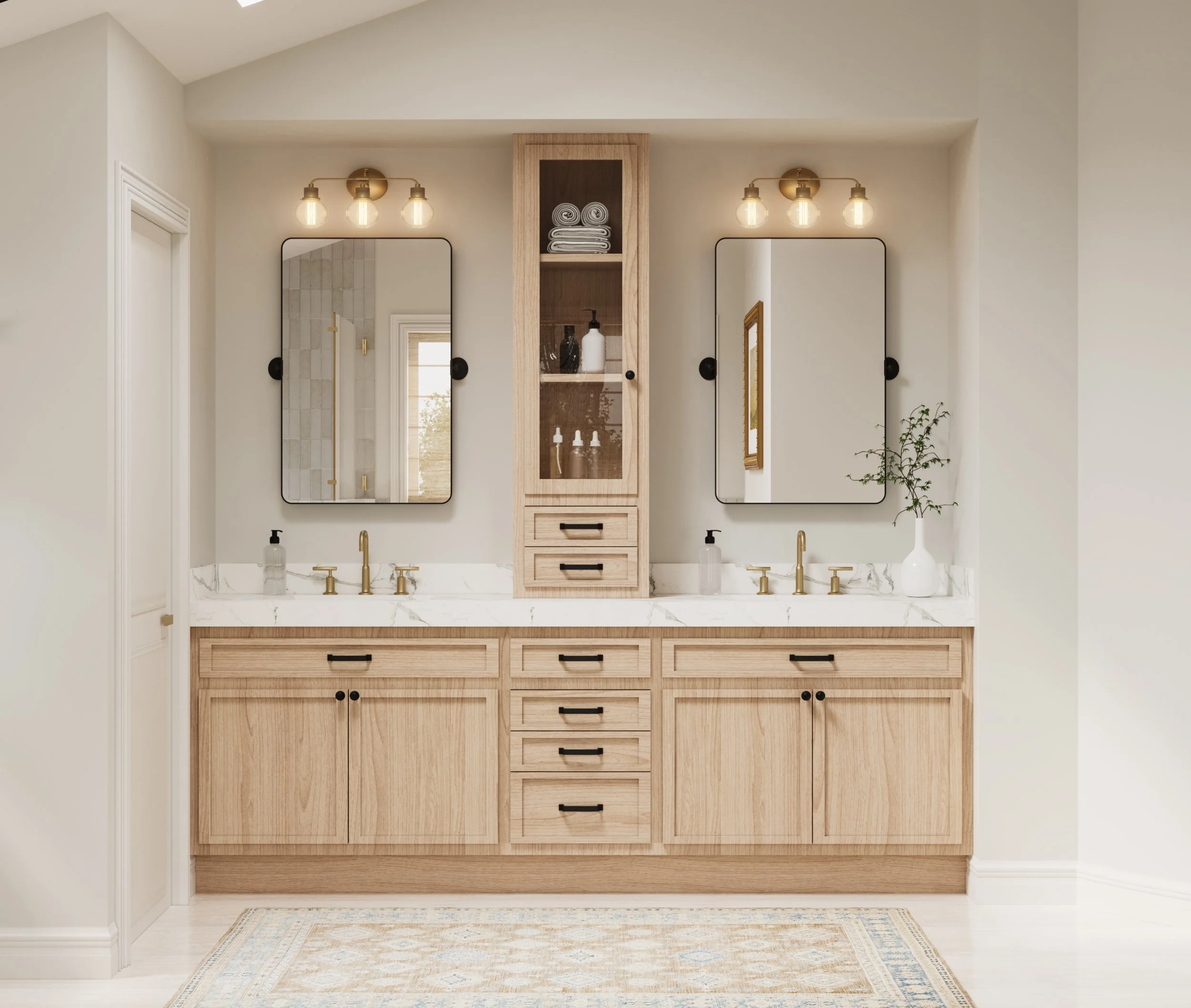 A double vanity bathroom with light wood cabinets, two mirrors, gold fixtures, and a central cabinet with open shelves and drawers, decorated with a vase and towels.