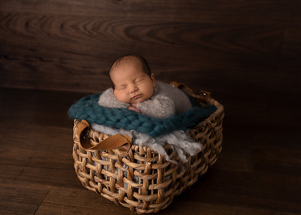 newborn in basket green rug Bannockburn